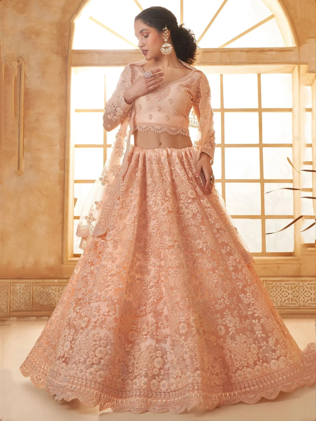Attractive Peach Embroidery Work Net Bridesmaid Lehenga Choli