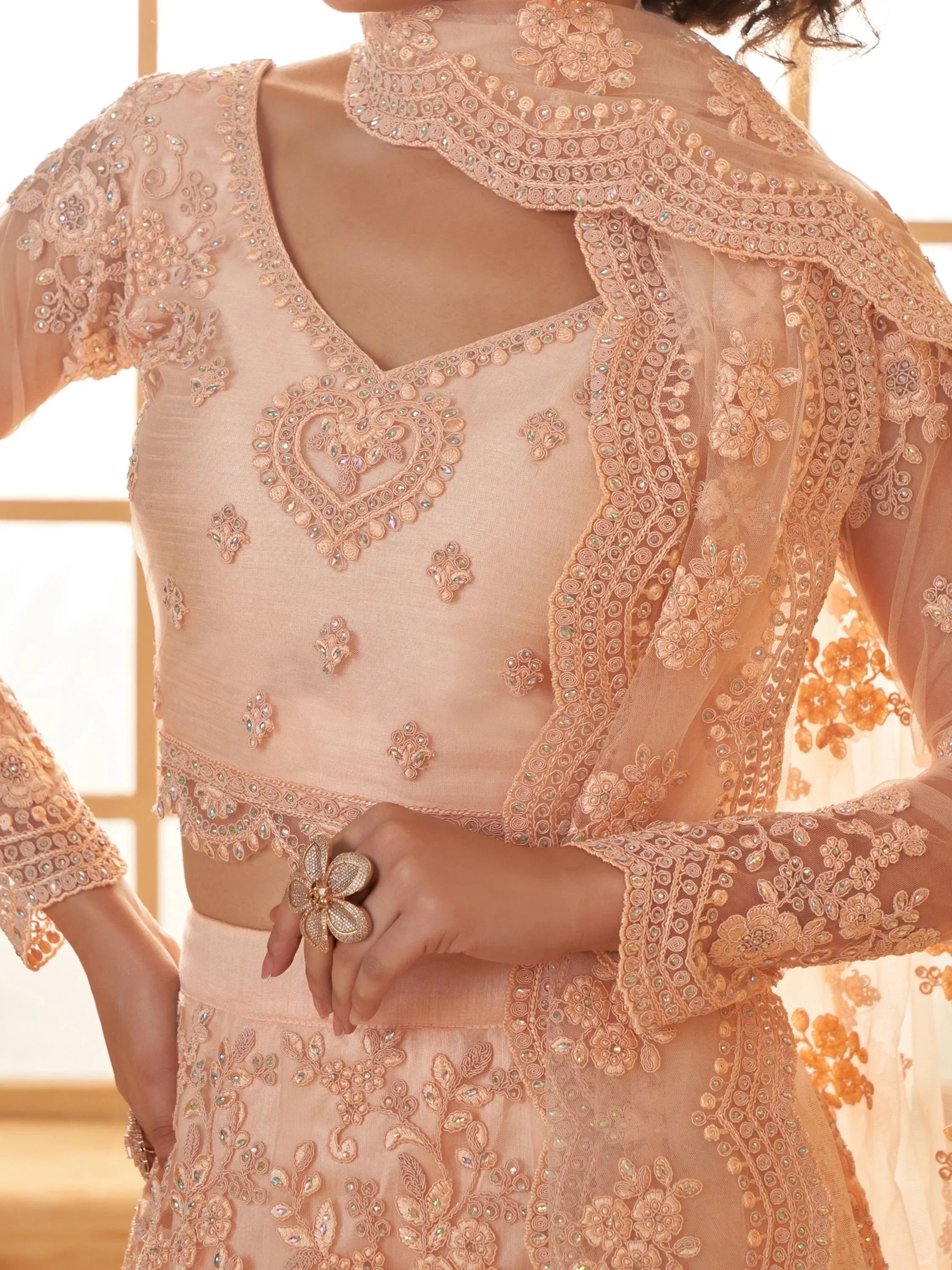 Attractive Peach Embroidery Work Net Bridesmaid Lehenga Choli