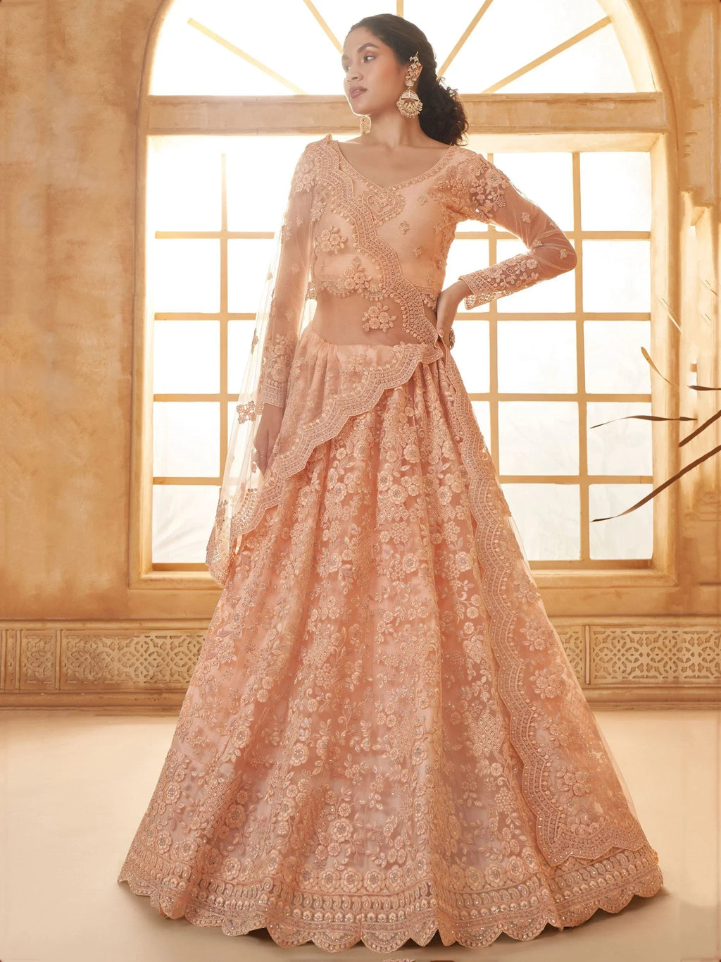 Attractive Peach Embroidery Work Net Bridesmaid Lehenga Choli