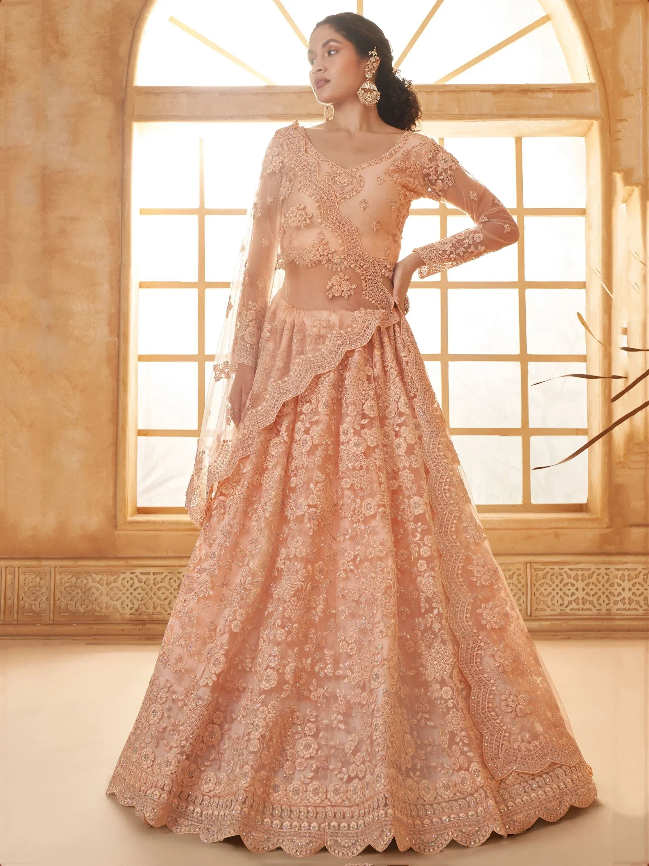 Attractive Peach Embroidery Work Net Bridesmaid Lehenga Choli