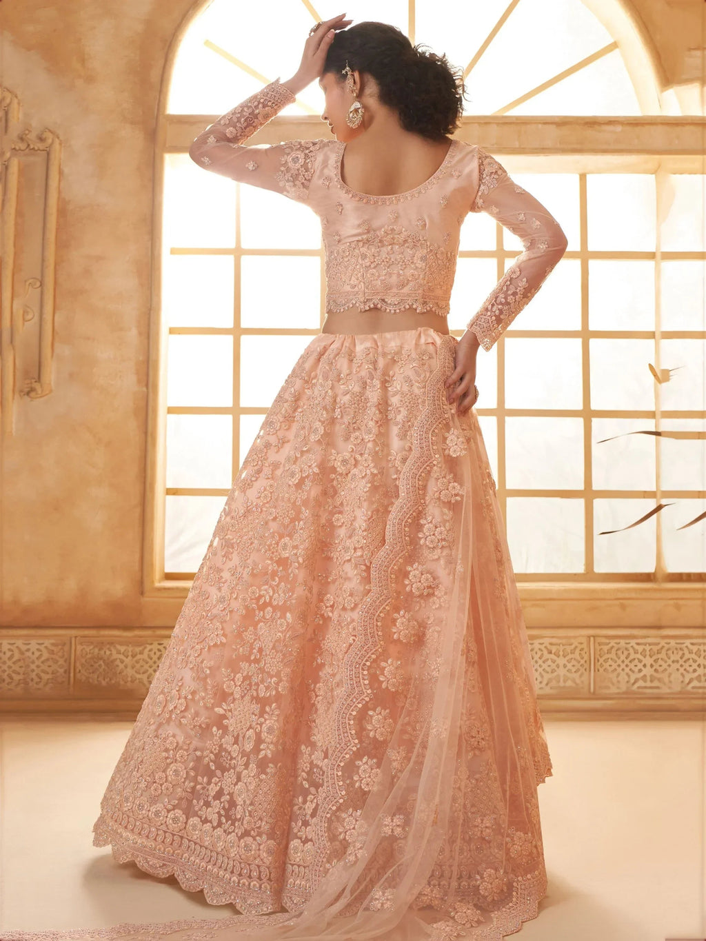 Attractive Peach Embroidery Work Net Bridesmaid Lehenga Choli