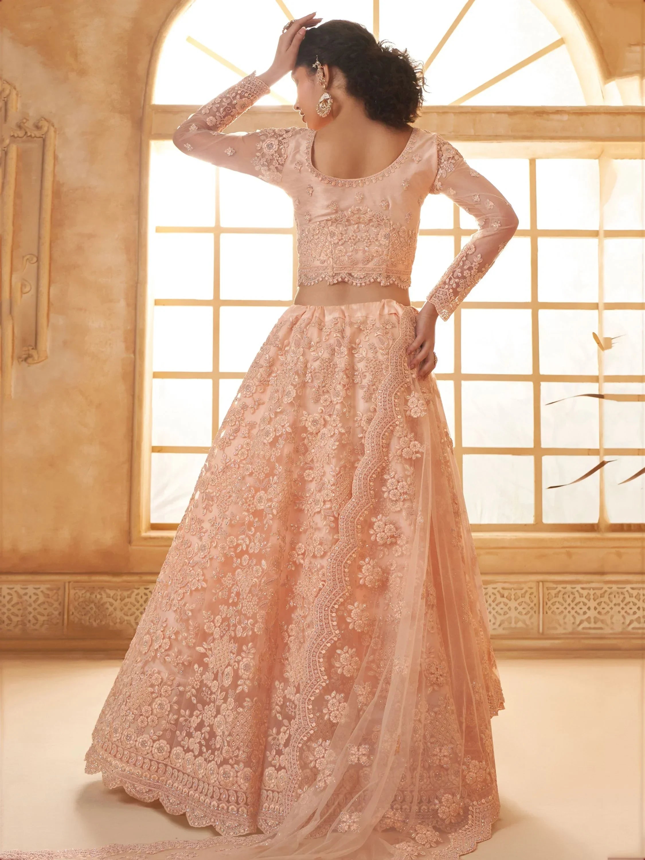 Attractive Peach Embroidery Work Net Bridesmaid Lehenga Choli