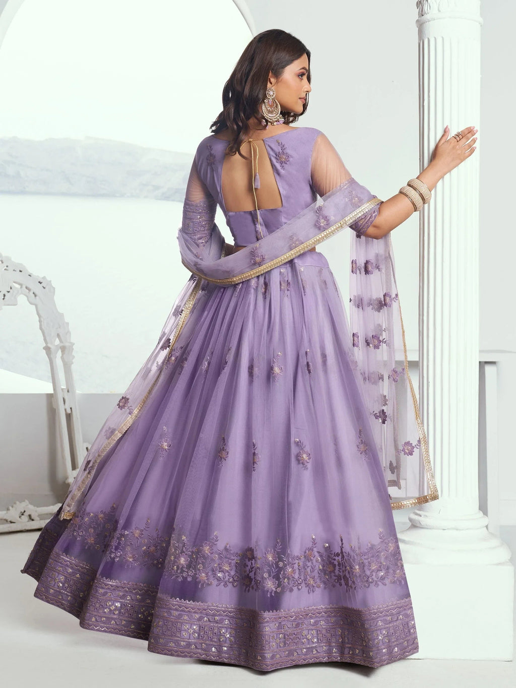 Awesome Lavender Color Embroidered Net Engagement Wear Lehenga Choli