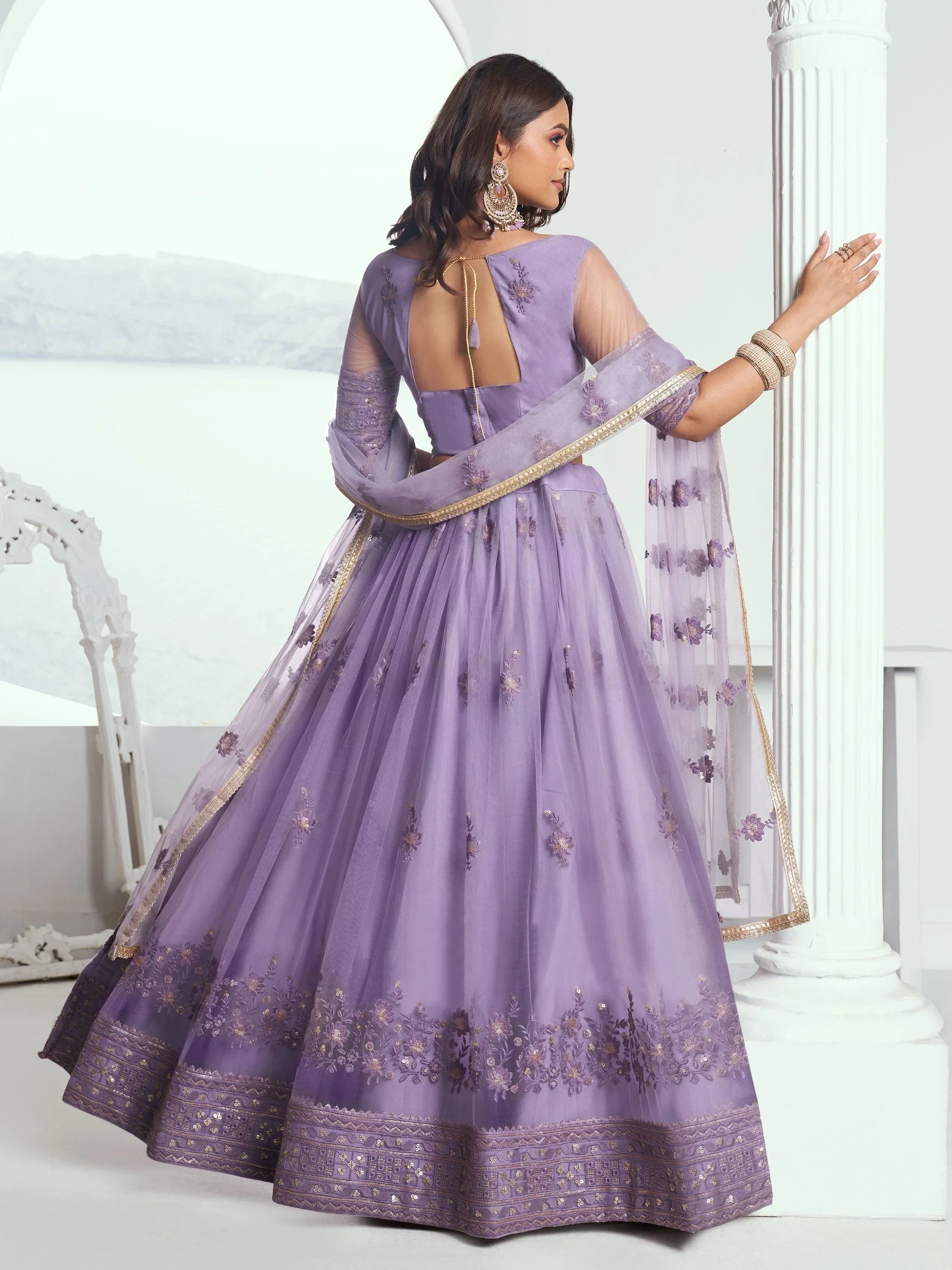 Awesome Lavender Color Embroidered Net Engagement Wear Lehenga Choli