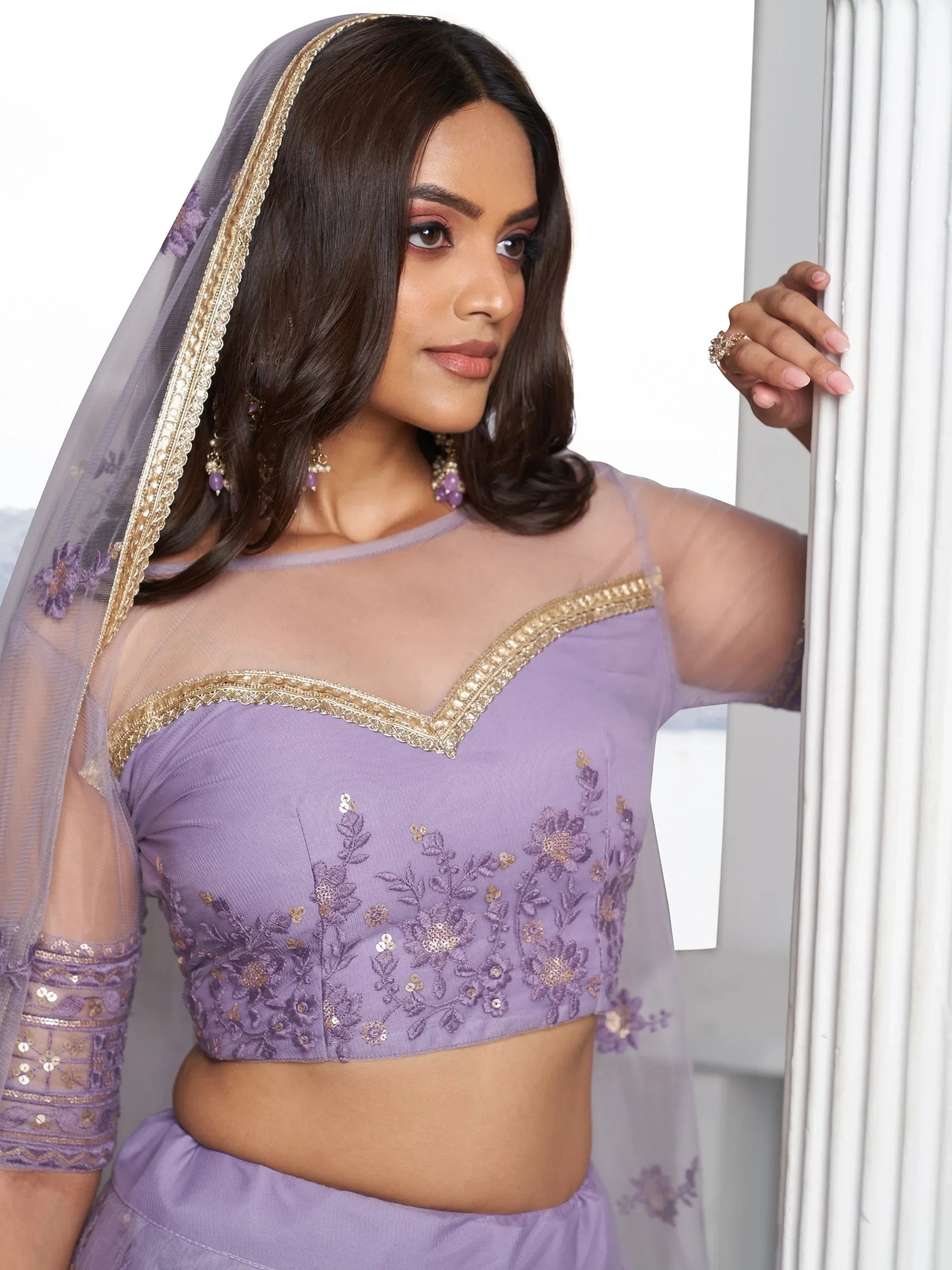 Awesome Lavender Color Embroidered Net Engagement Wear Lehenga Choli