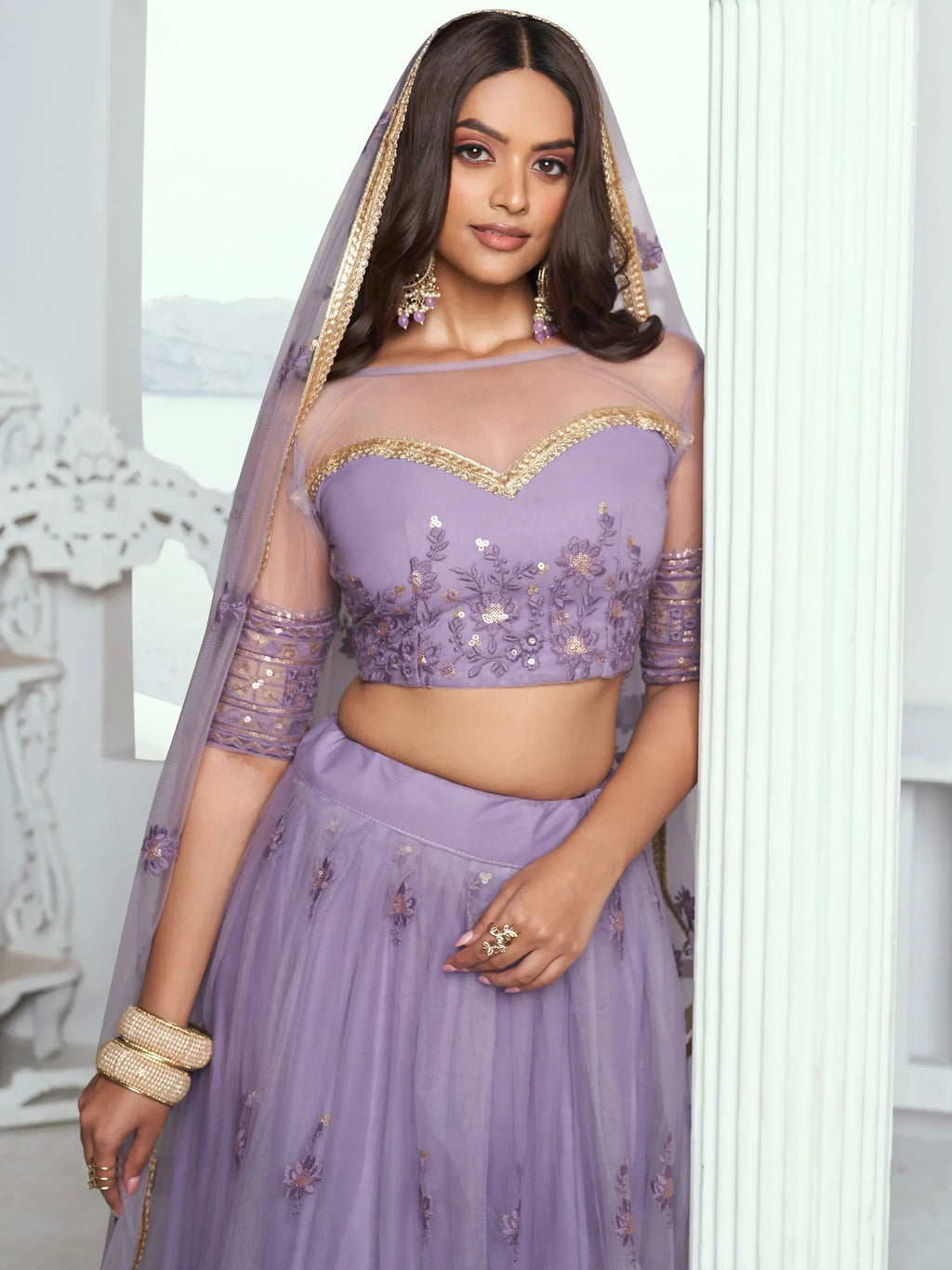 Awesome Lavender Color Embroidered Net Engagement Wear Lehenga Choli