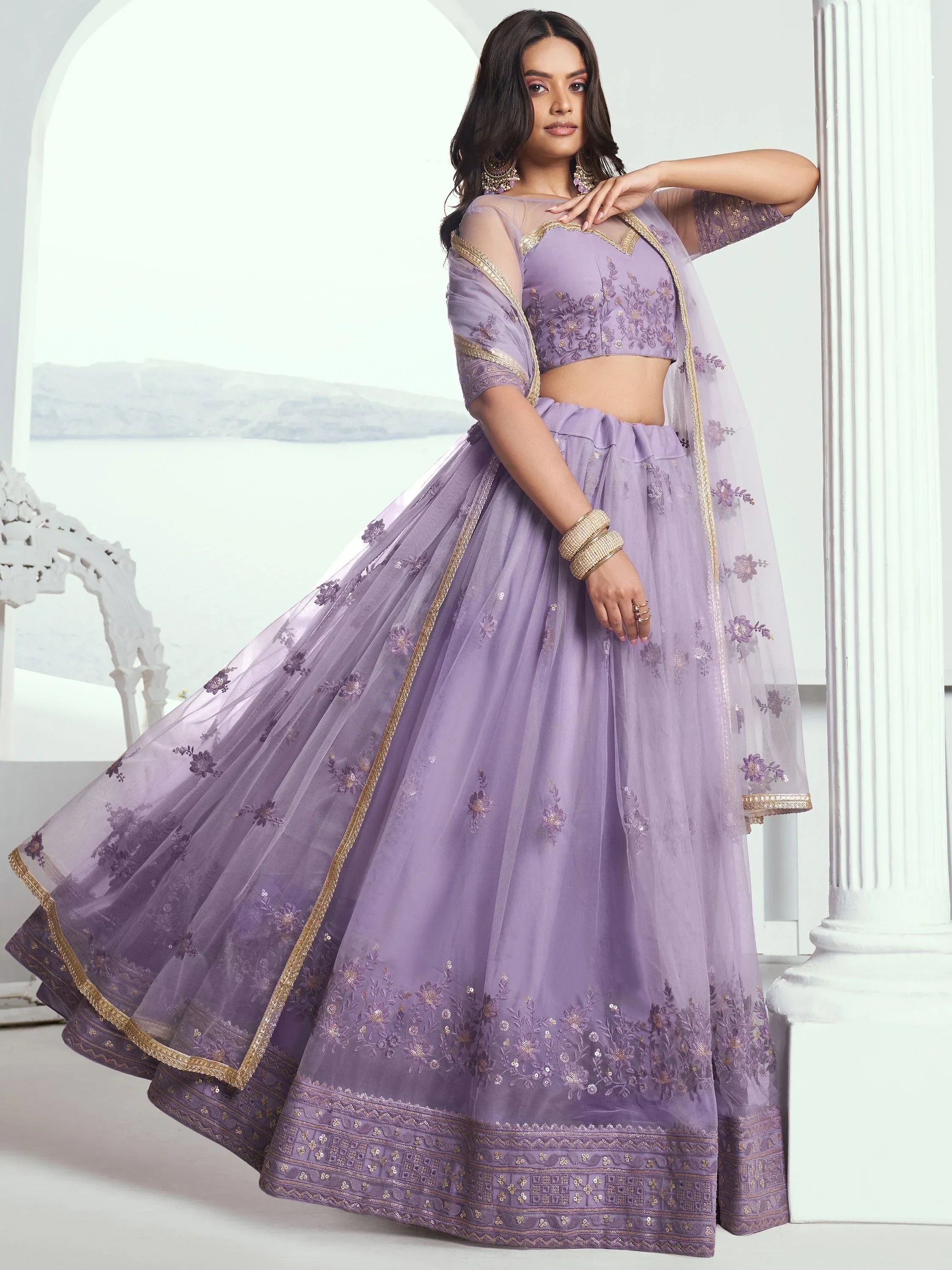 Awesome Lavender Color Embroidered Net Engagement Wear Lehenga Choli