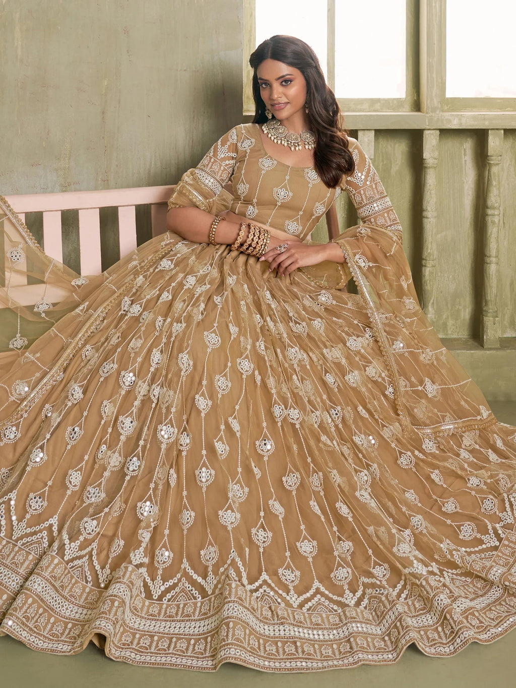Beautiful Beige Thread Embroidered Net Lehenga Choli With Dupatta