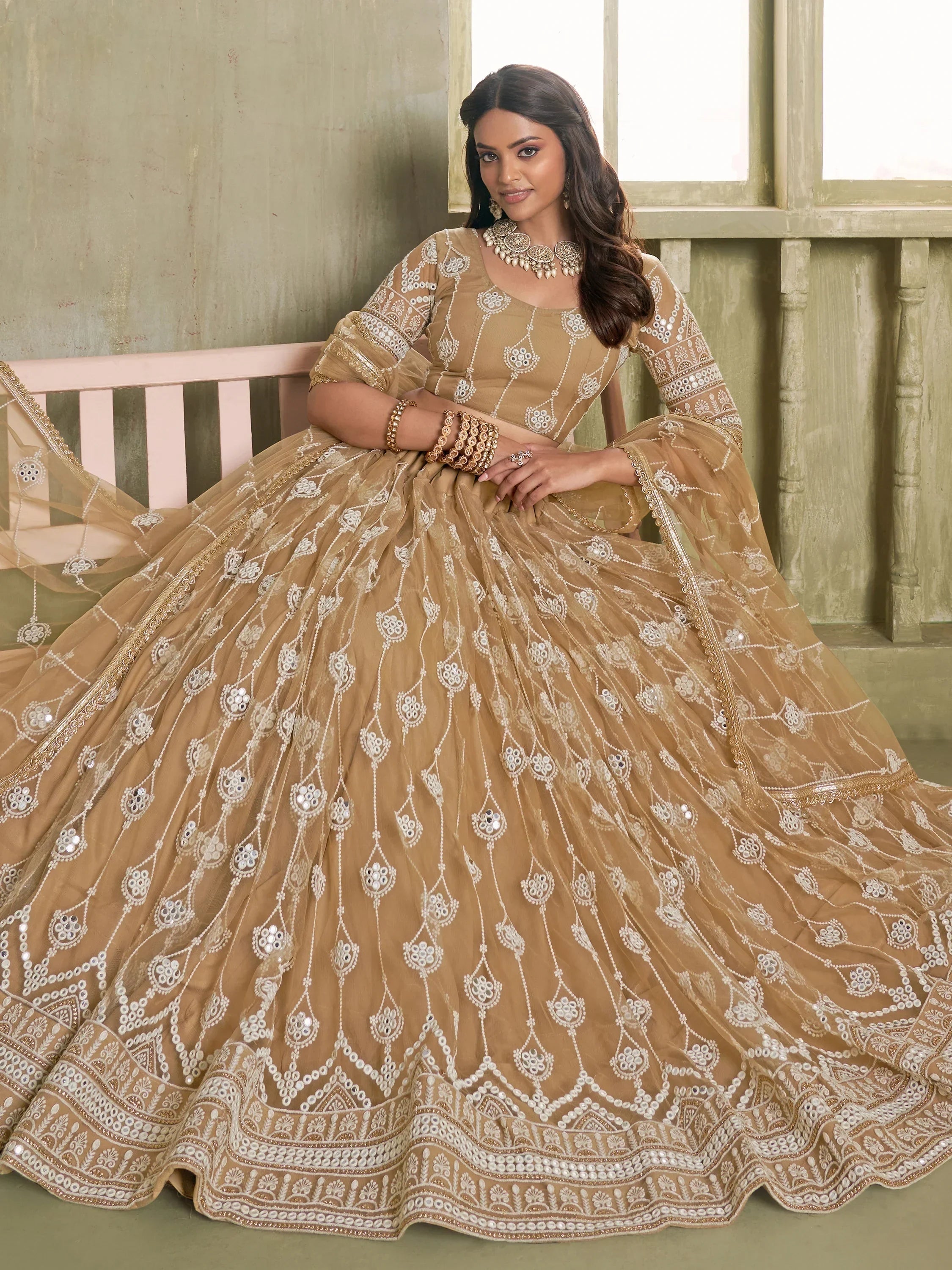 Beautiful Beige Thread Embroidered Net Lehenga Choli With Dupatta