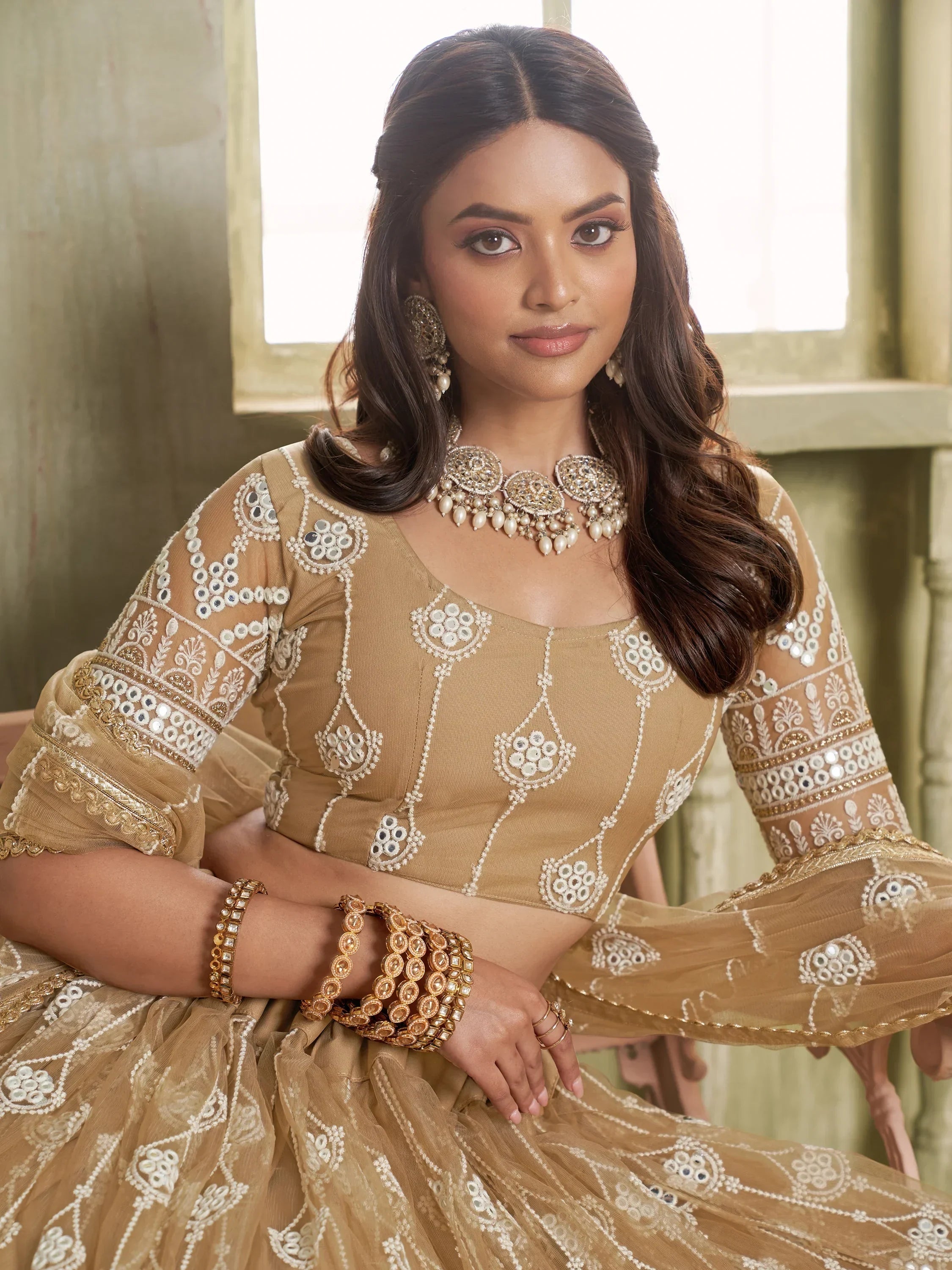 Beautiful Beige Thread Embroidered Net Lehenga Choli With Dupatta