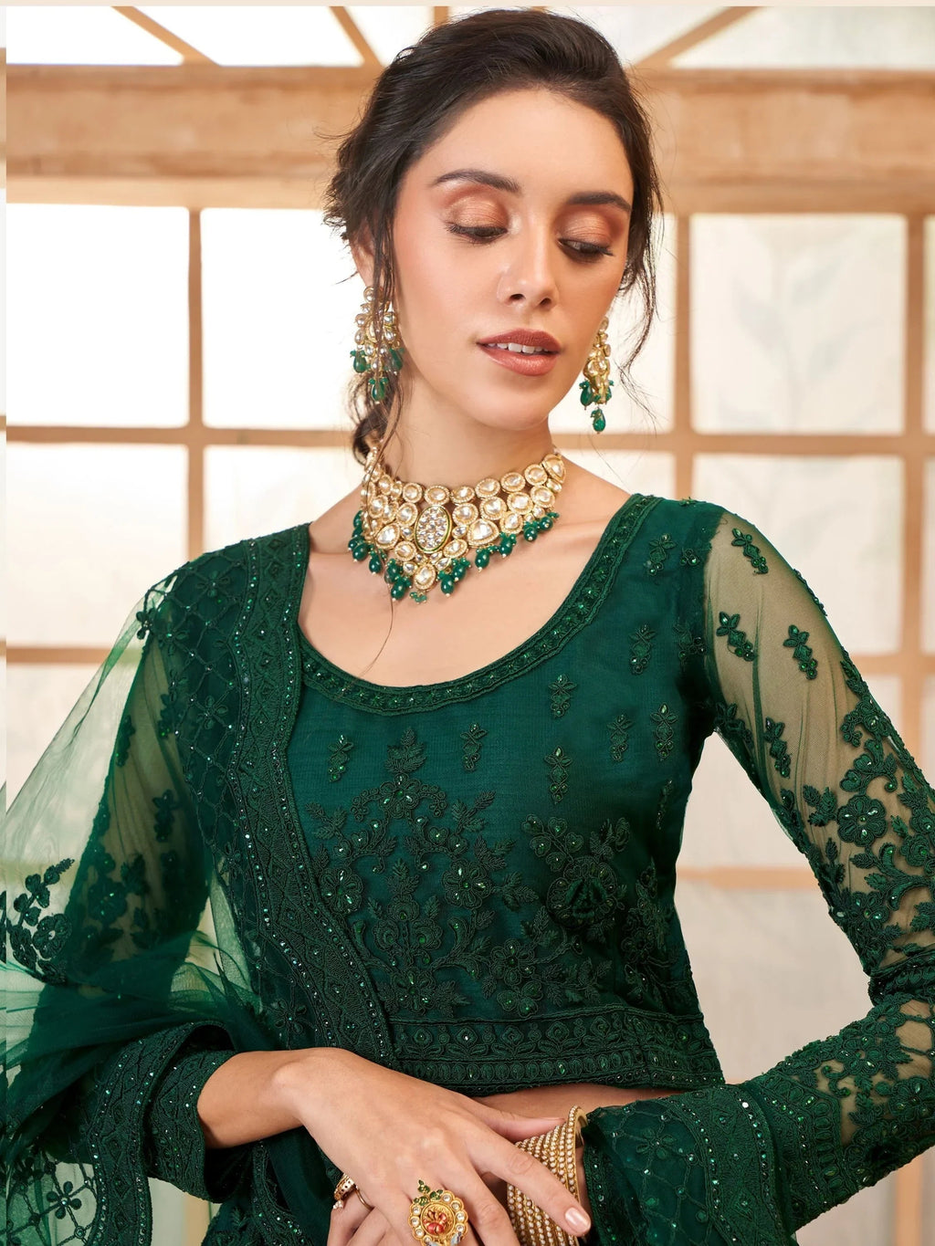 Beautiful Green Embroidered Net Mehendi Wear Lehenga Choli