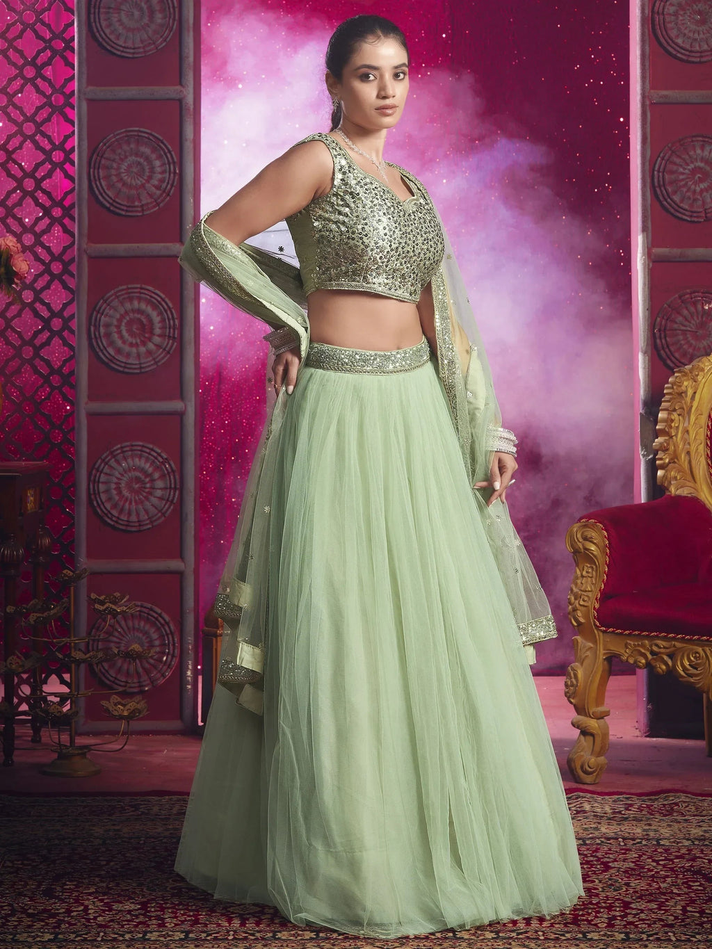 Beautiful Light Pista Sequins Net Engagement Wear Lehenga Choli
