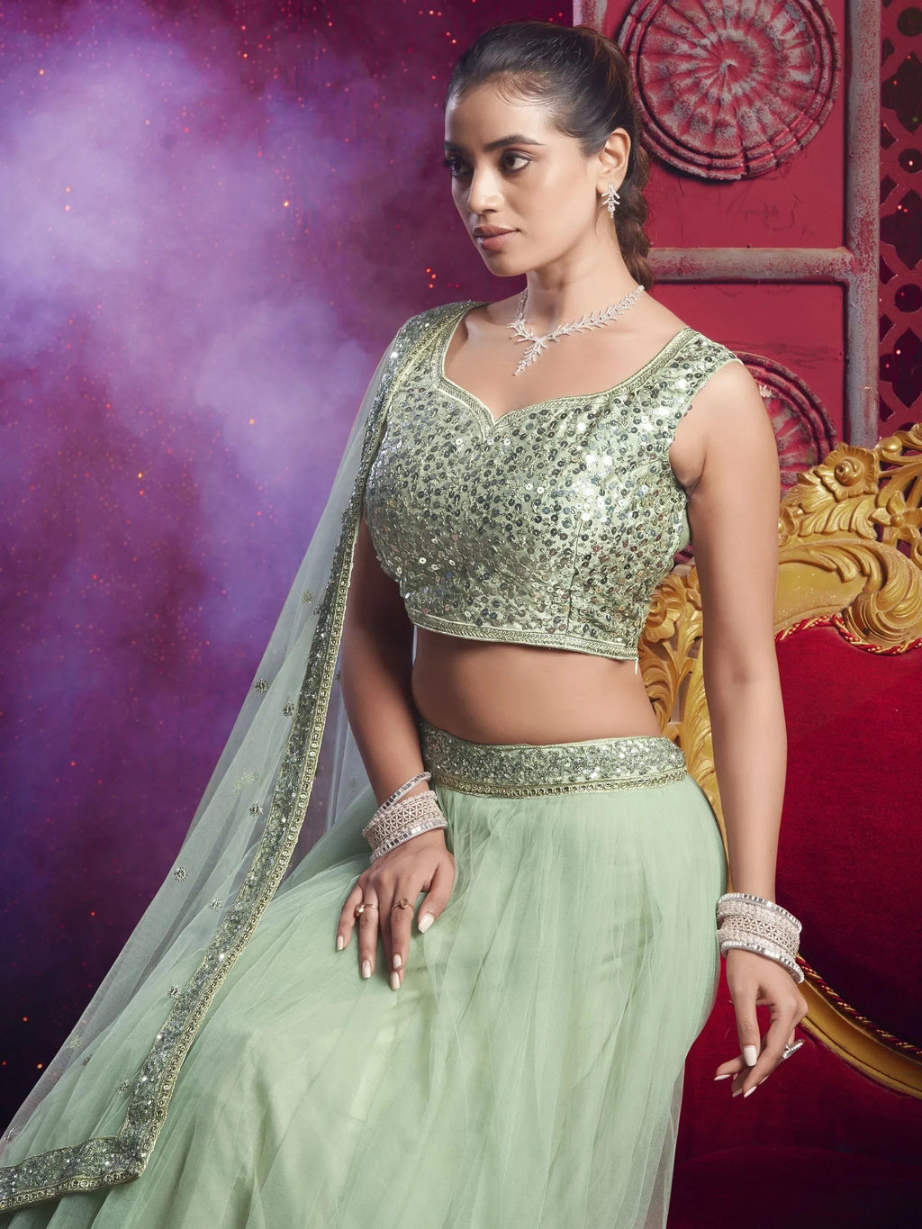 Beautiful Light Pista Sequins Net Engagement Wear Lehenga Choli