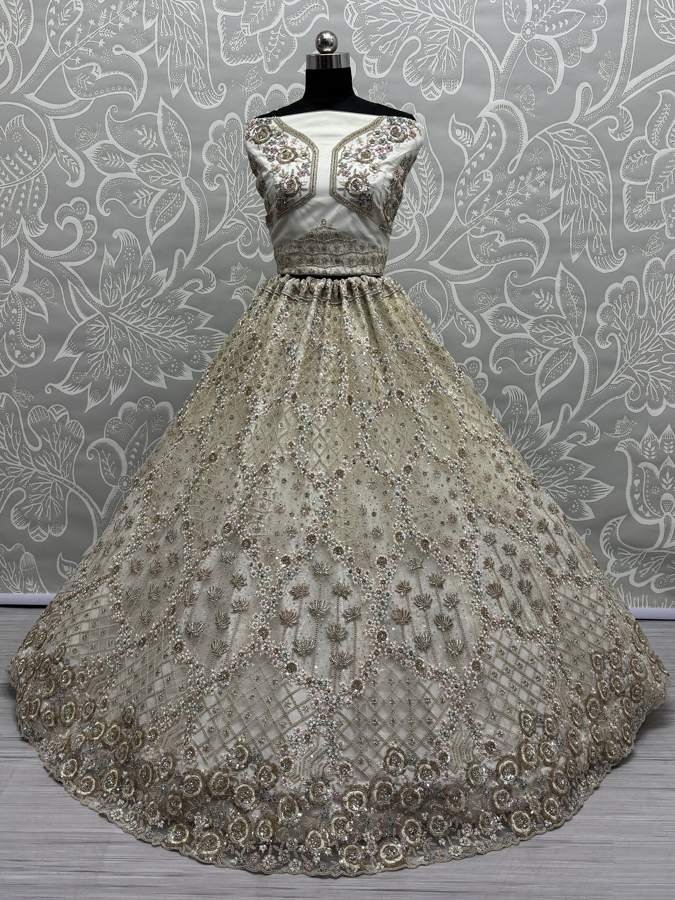 Off White Wonderful Zircon Work Net Bridesmaid Lehenga Choli With Dupatta