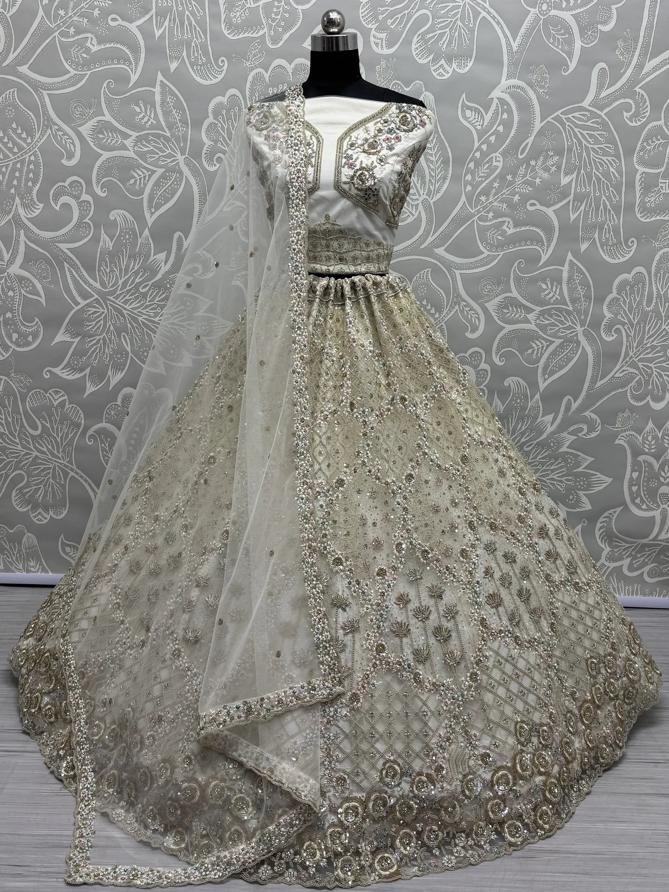 Off White Wonderful Zircon Work Net Bridesmaid Lehenga Choli With Dupatta
