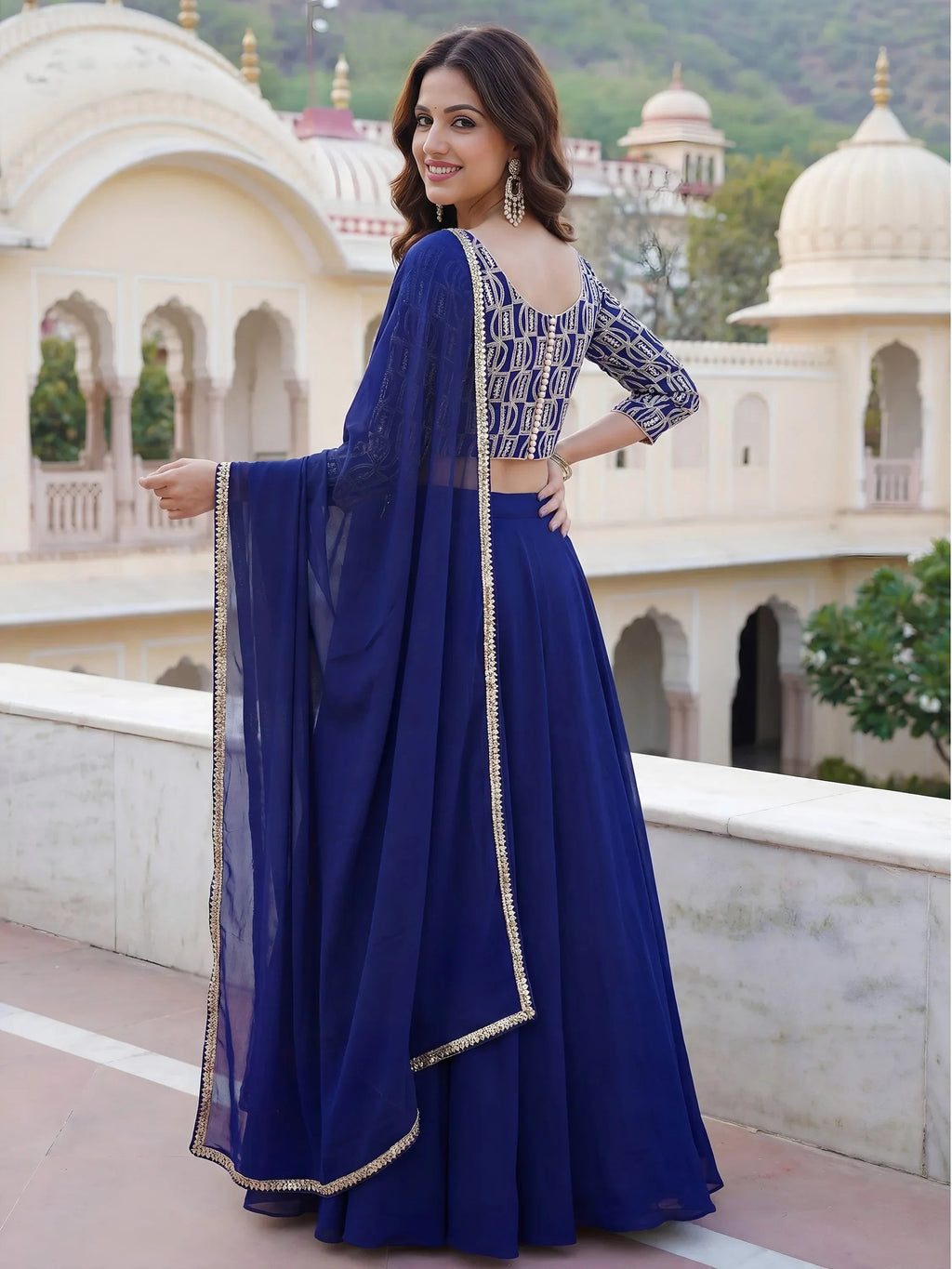 Royal Blue Ravishing Sequins Georgette Party Wear Lehenga Choli With Dupatta