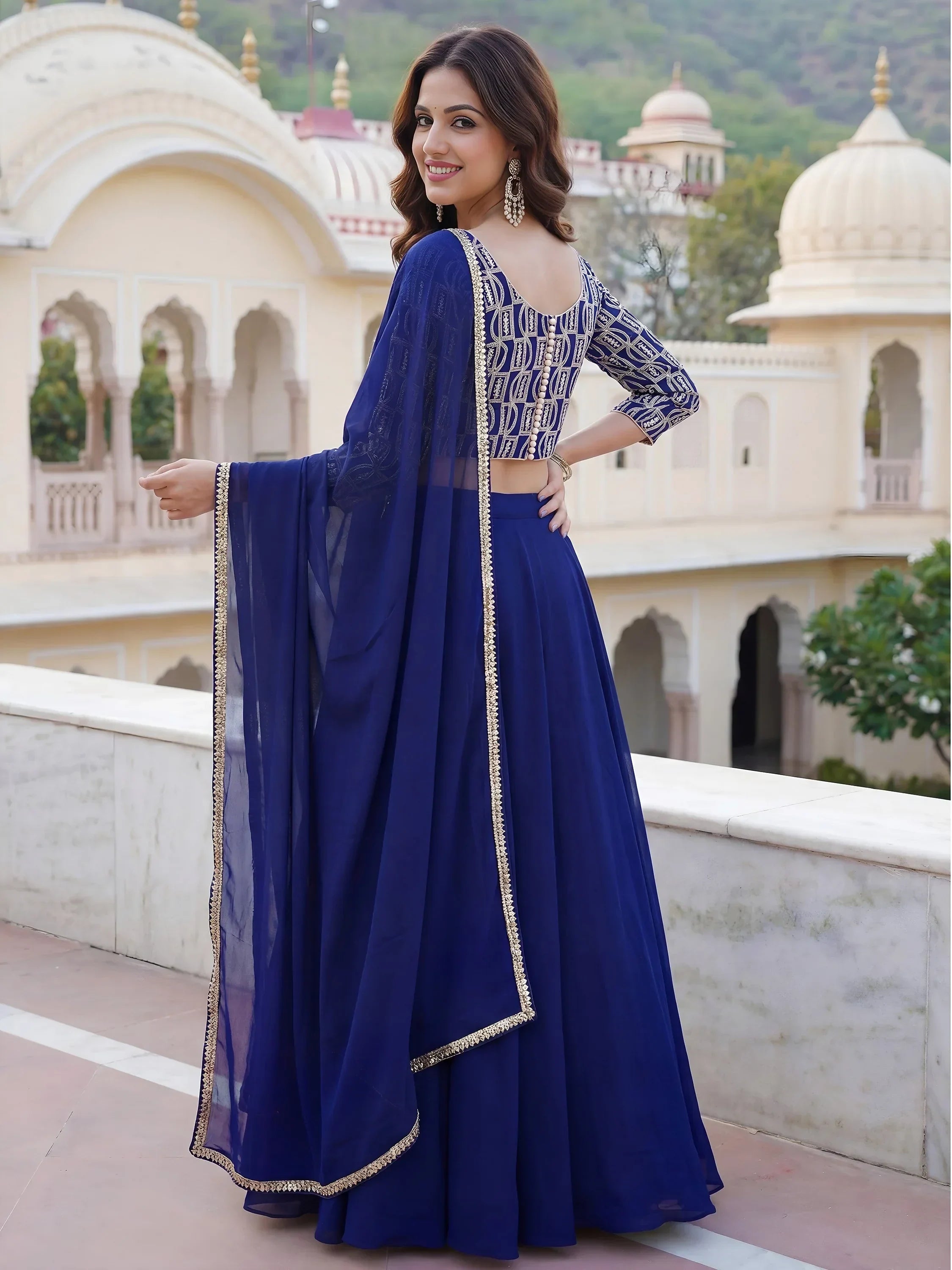 Royal Blue Ravishing Sequins Georgette Party Wear Lehenga Choli With Dupatta