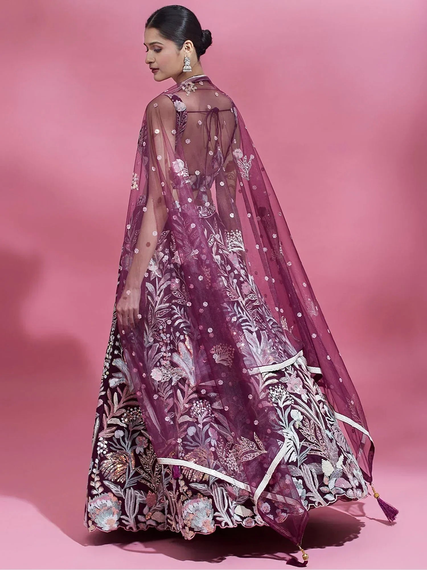 Wine Ravishing Color Sequins Soft Net Party Wear Lehenga Choli