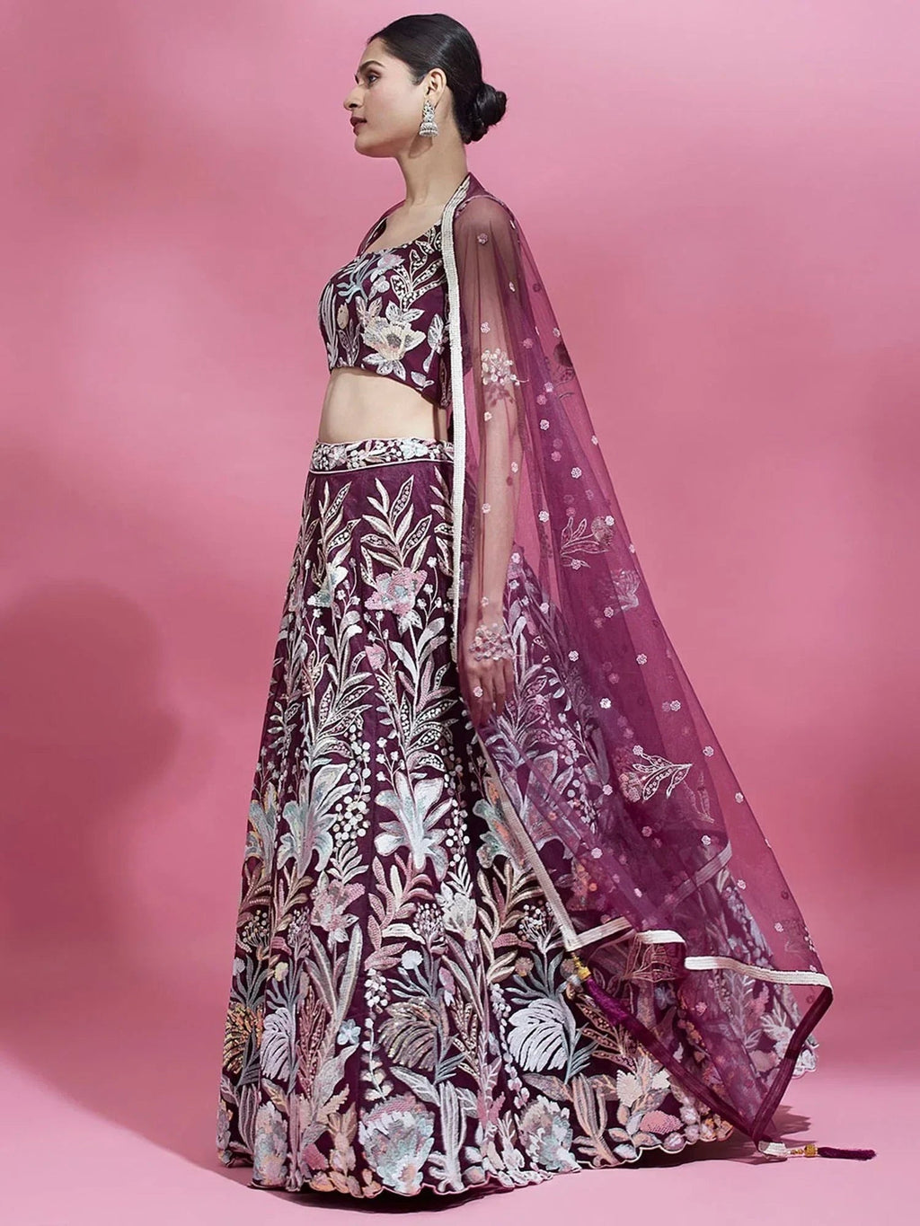 Wine Ravishing Color Sequins Soft Net Party Wear Lehenga Choli