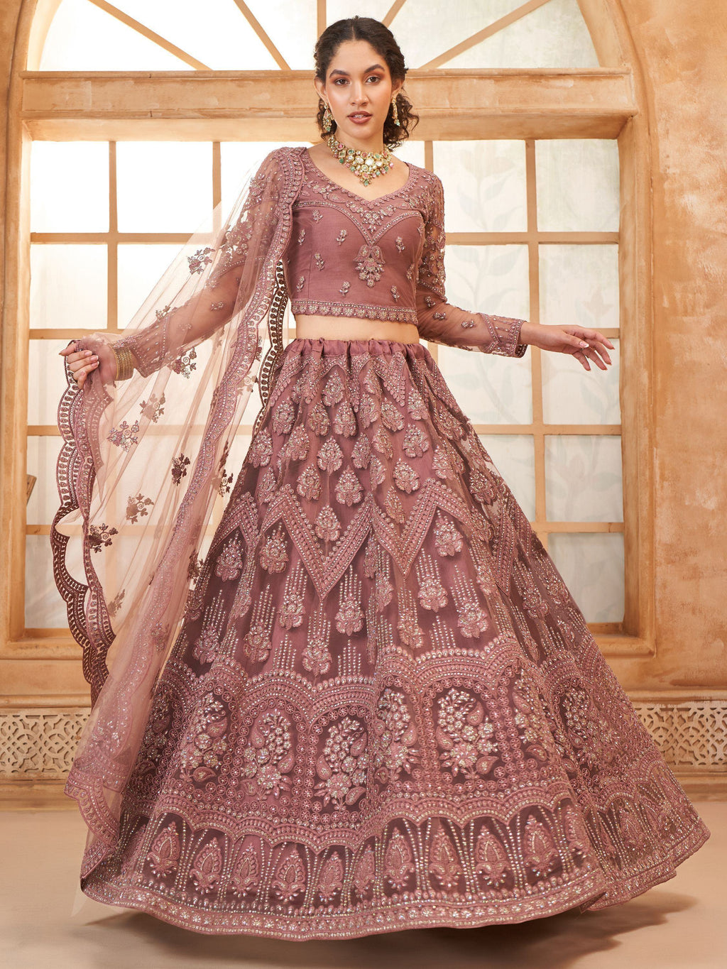Captivating Mauve Embroidered Net Reception Wear Lehenga Choli