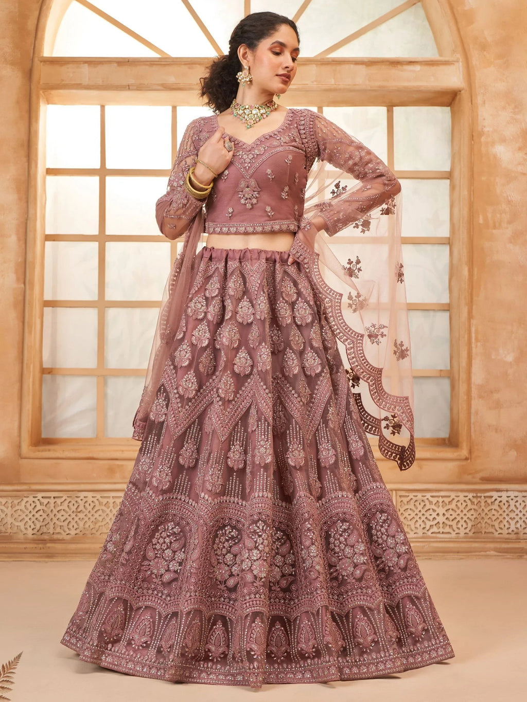 Captivating Mauve Embroidered Net Reception Wear Lehenga Choli