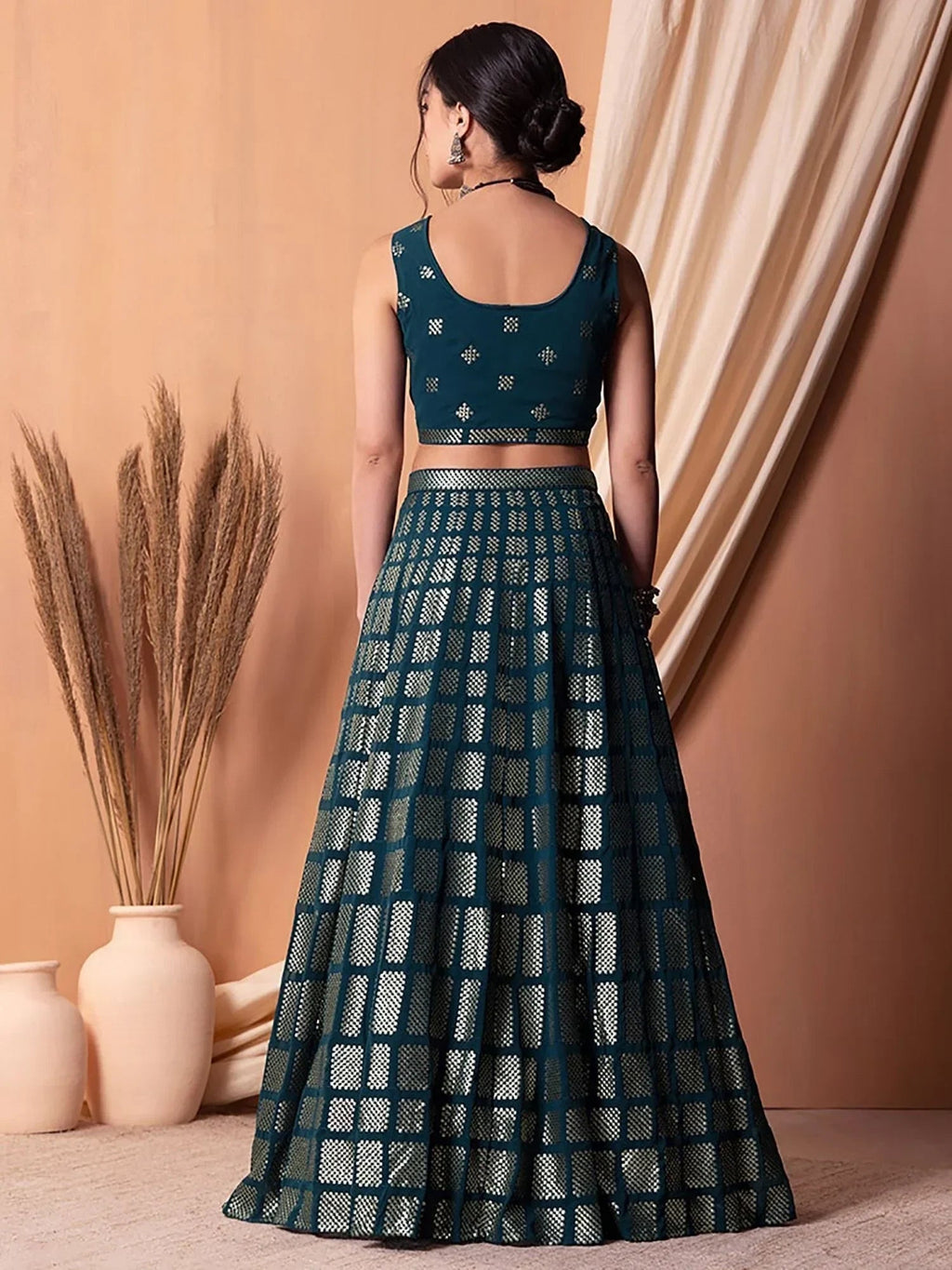 Captivating Teal Blue Sequins Georgette Party Wear Lehenga Choli