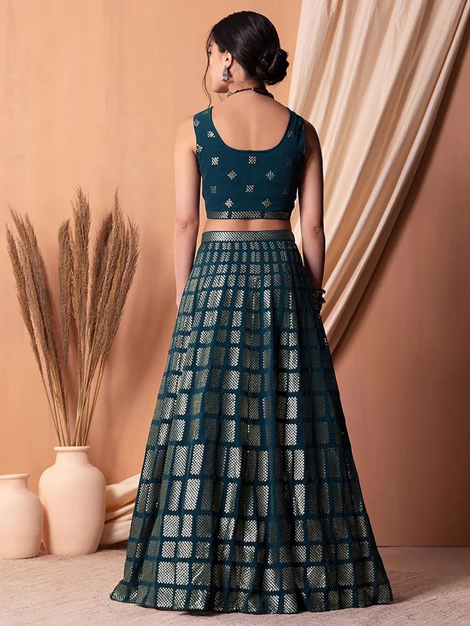 Captivating Teal Blue Sequins Georgette Party Wear Lehenga Choli