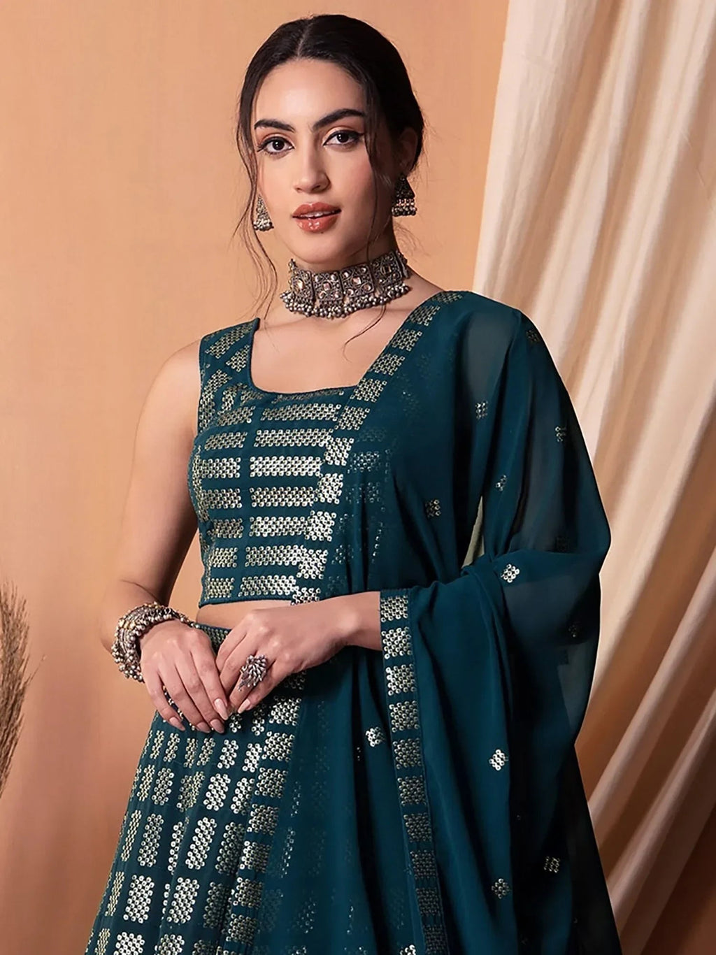Captivating Teal Blue Sequins Georgette Party Wear Lehenga Choli