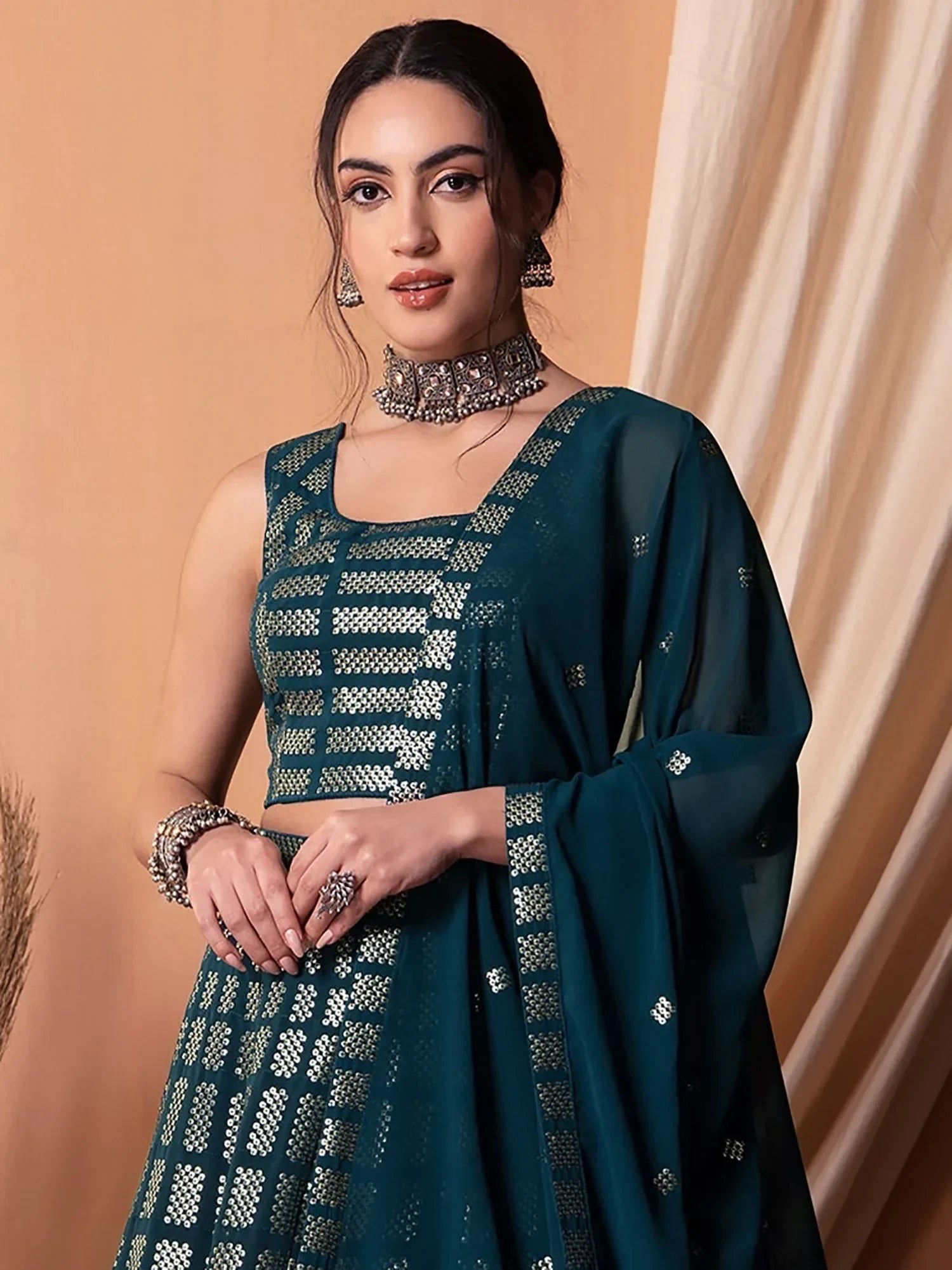 Captivating Teal Blue Sequins Georgette Party Wear Lehenga Choli