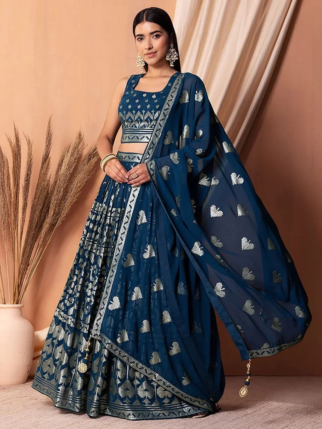 Charming Blue Sequins Georgette Sangeet Wear Lehenga Choli