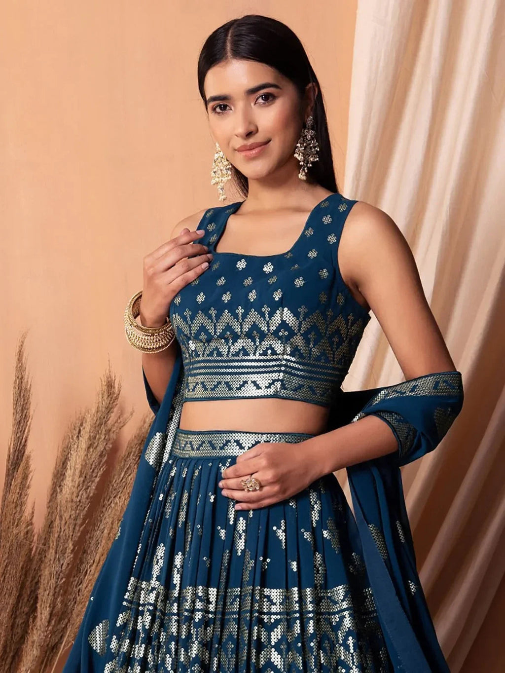 Charming Blue Sequins Georgette Sangeet Wear Lehenga Choli