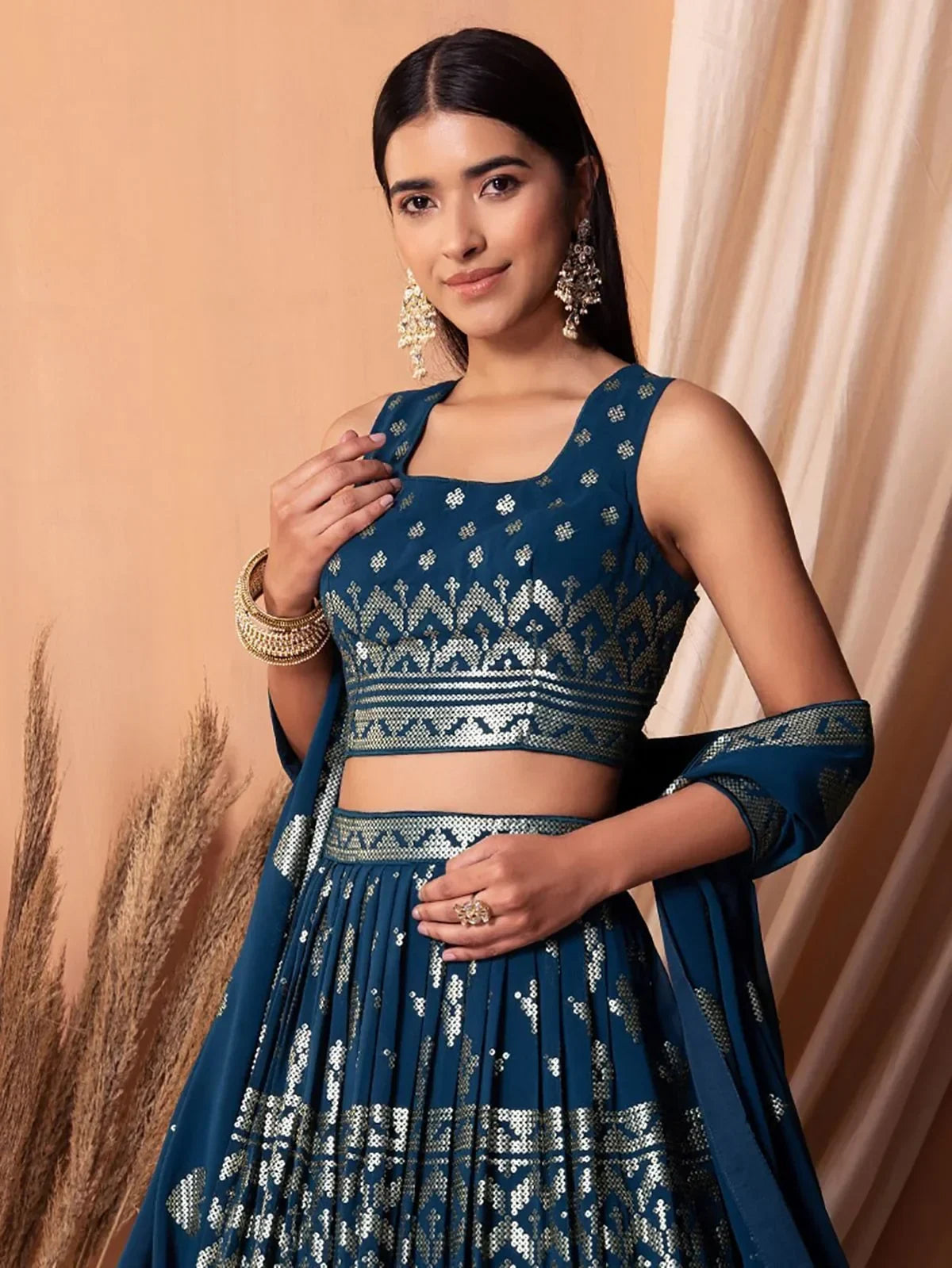 Charming Blue Sequins Georgette Sangeet Wear Lehenga Choli