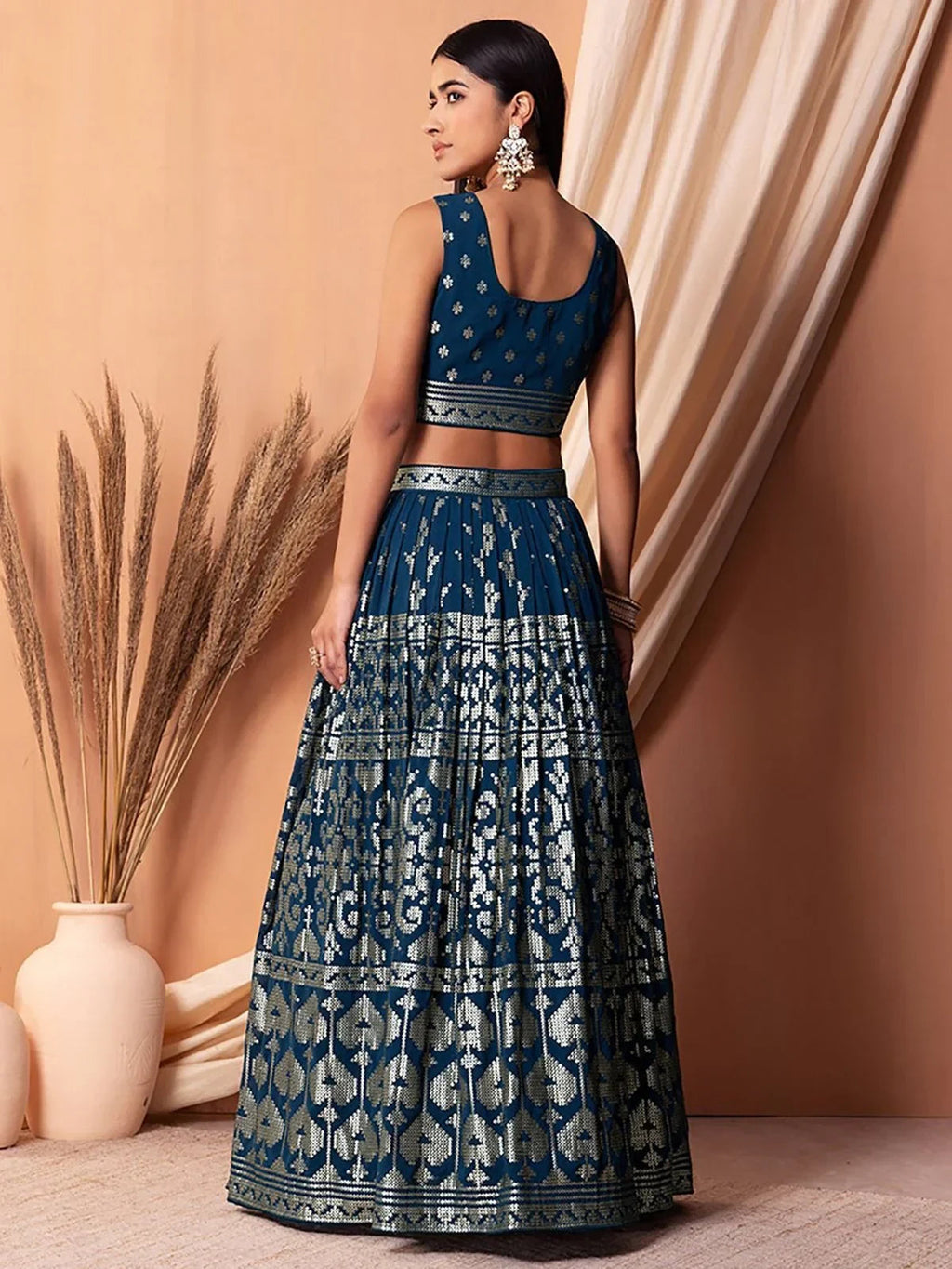 Charming Blue Sequins Georgette Sangeet Wear Lehenga Choli