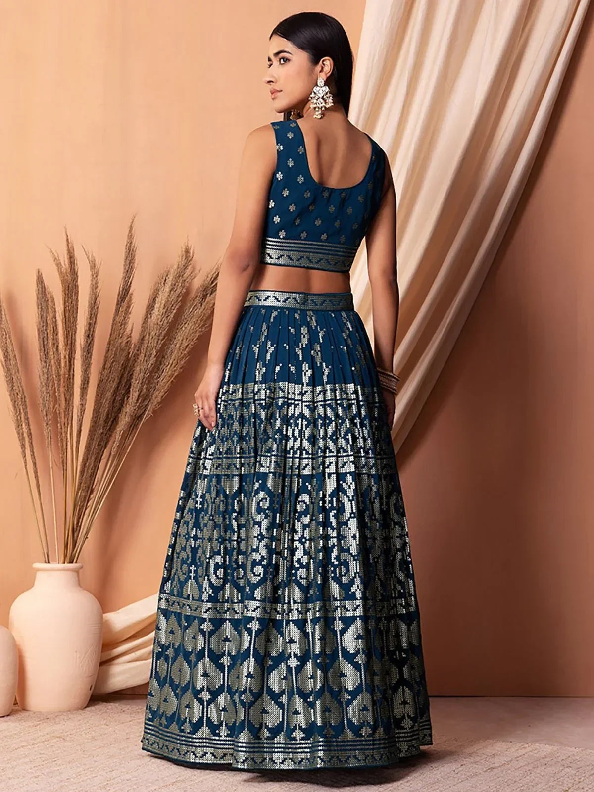 Charming Blue Sequins Georgette Sangeet Wear Lehenga Choli