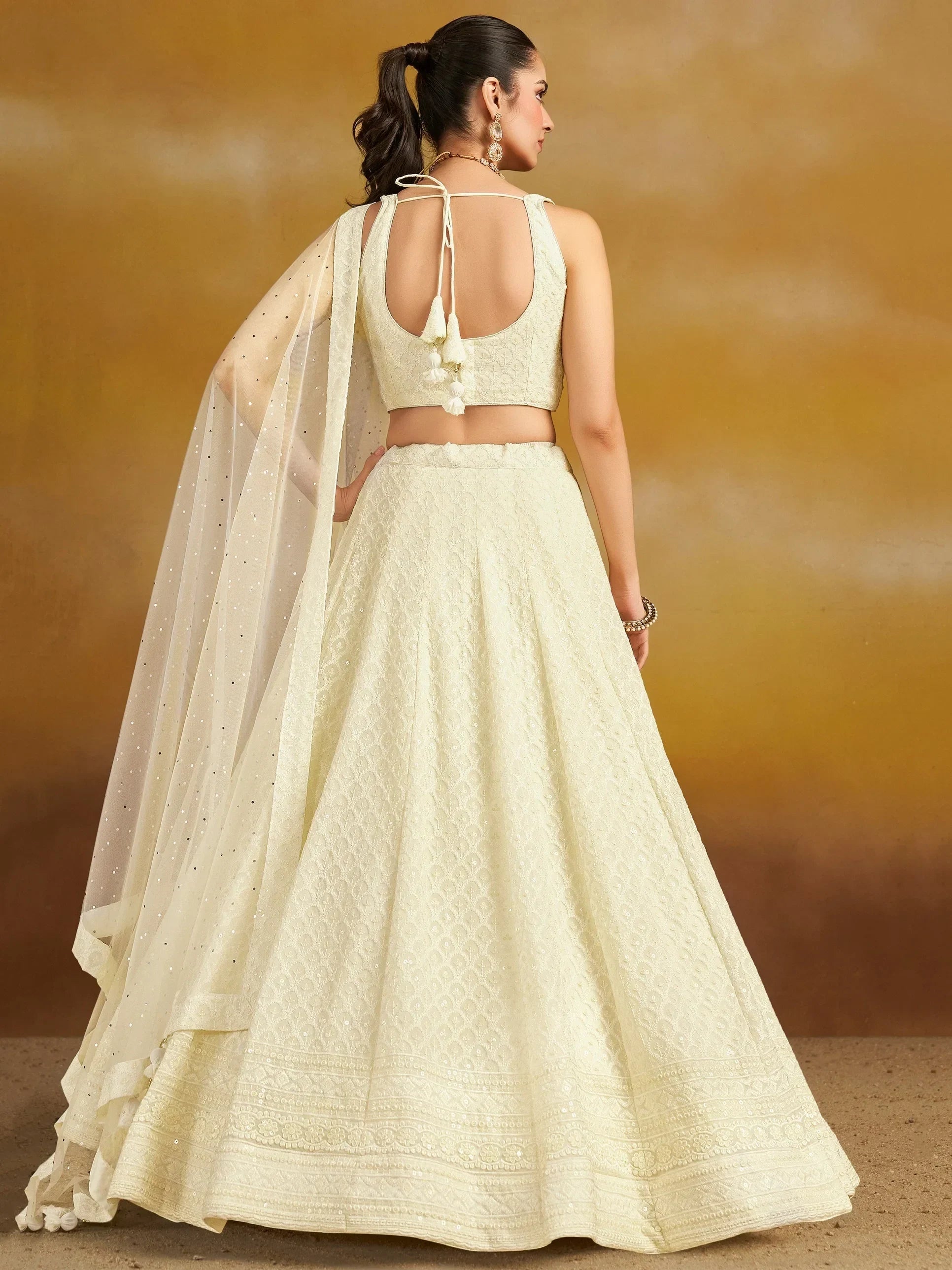 Charming Off-White Sequins Georgette Festive Wear Lehenga Choli