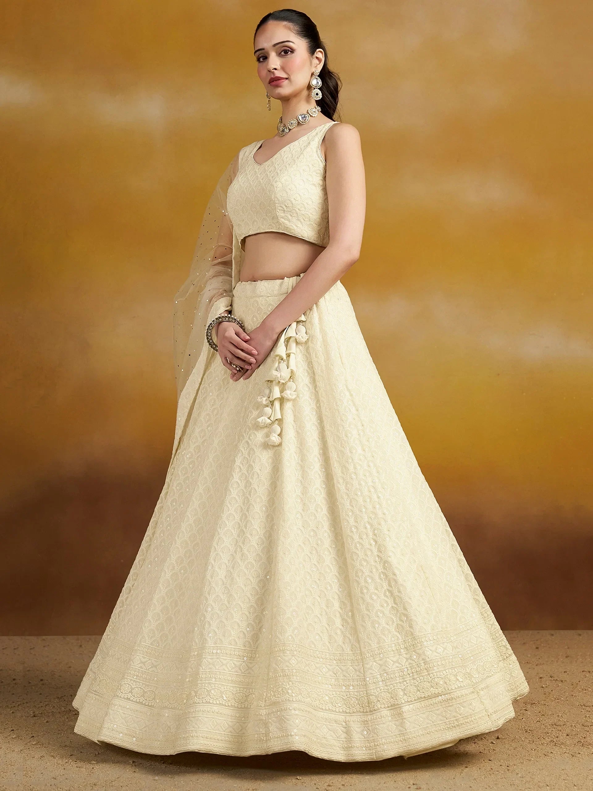 Charming Off-White Sequins Georgette Festive Wear Lehenga Choli