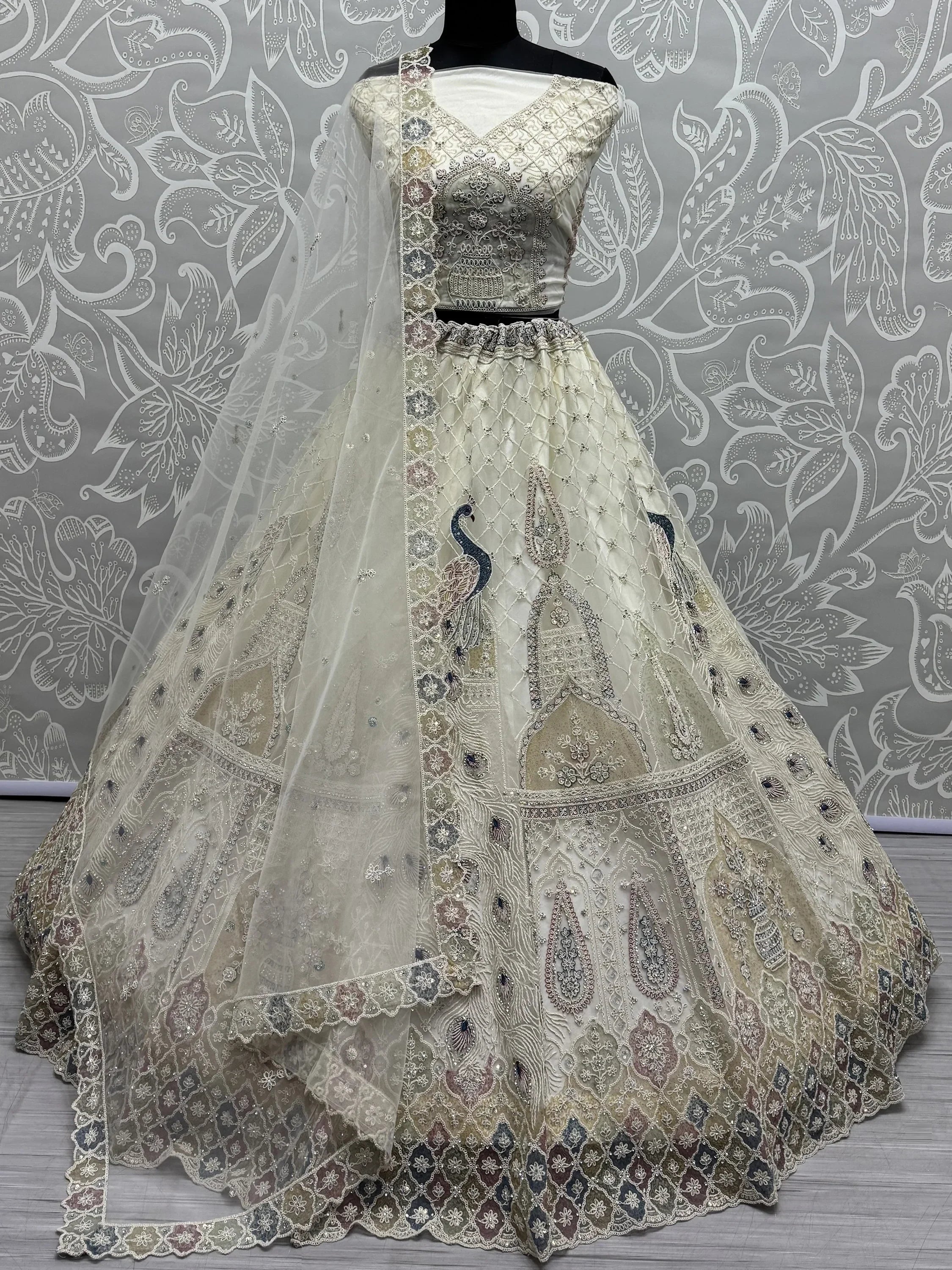Off White Gorgeous Sequins Net Engagement Wear Lehenga Choli