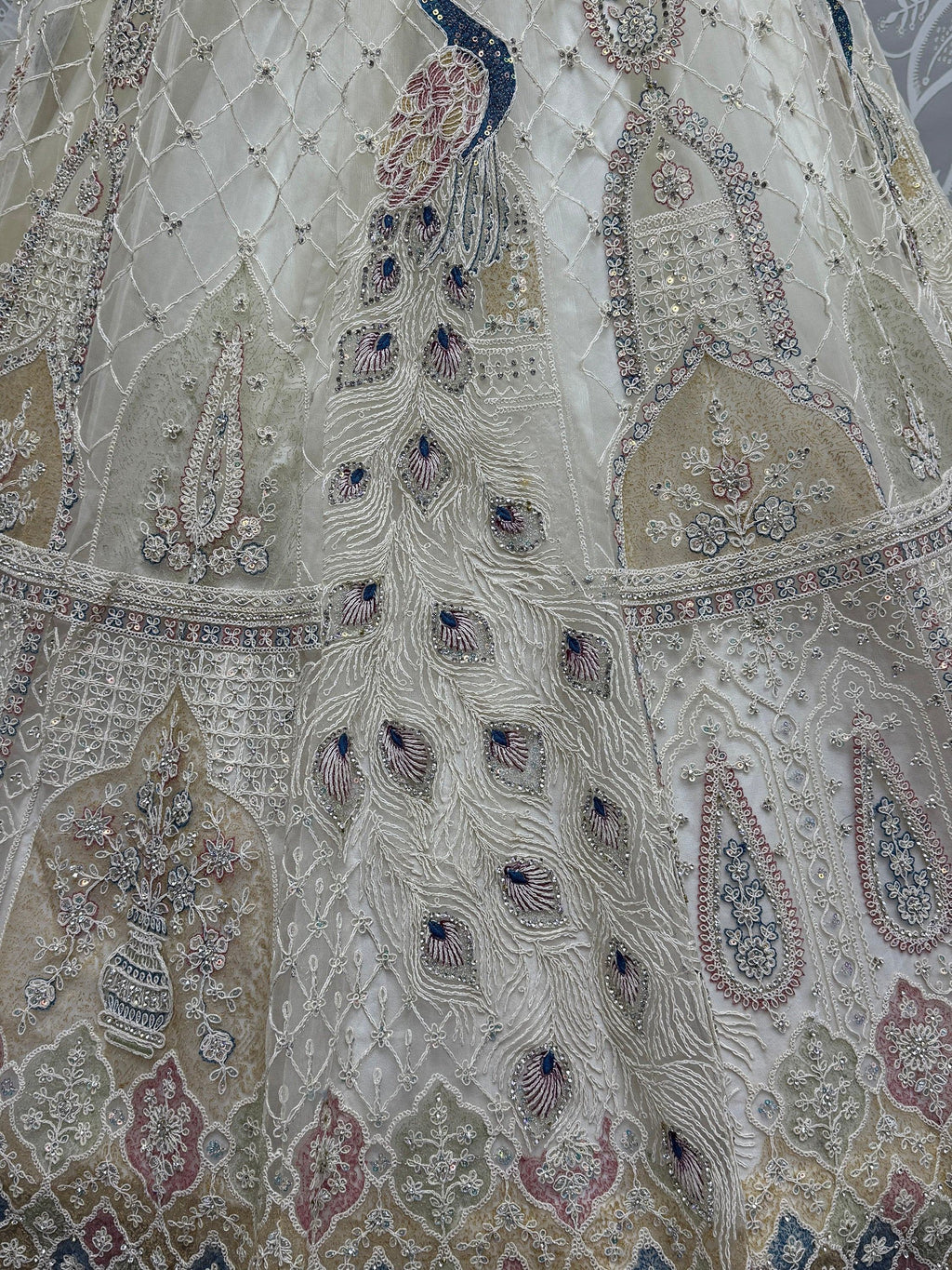 Off White Gorgeous Sequins Net Engagement Wear Lehenga Choli