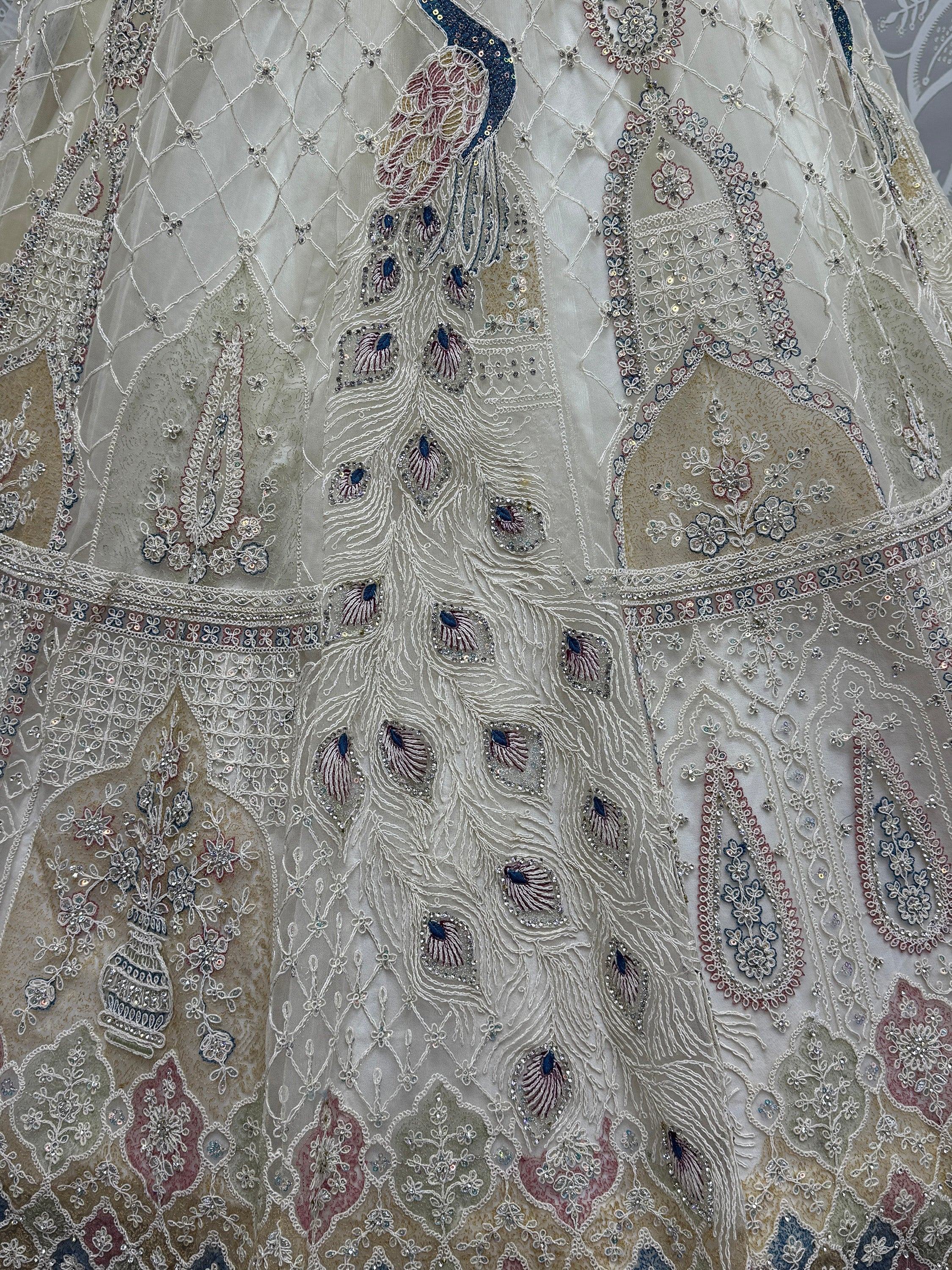 Off White Gorgeous Sequins Net Engagement Wear Lehenga Choli