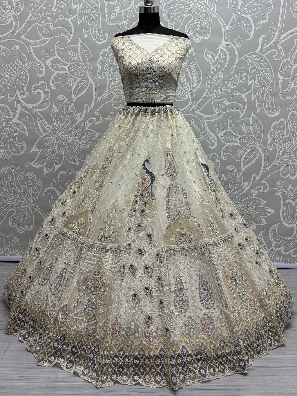 Off White Gorgeous Sequins Net Engagement Wear Lehenga Choli