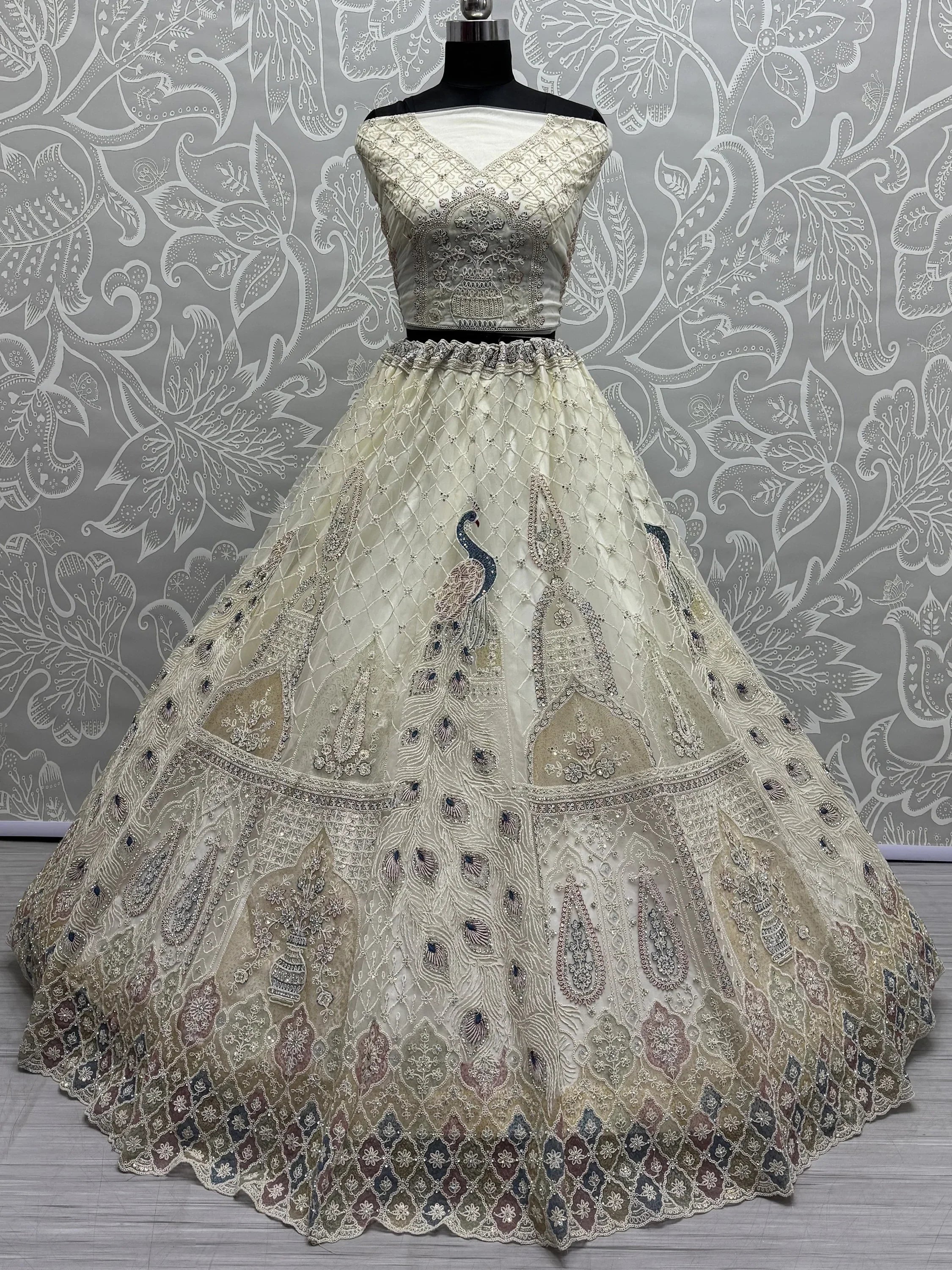 Off White Gorgeous Sequins Net Engagement Wear Lehenga Choli