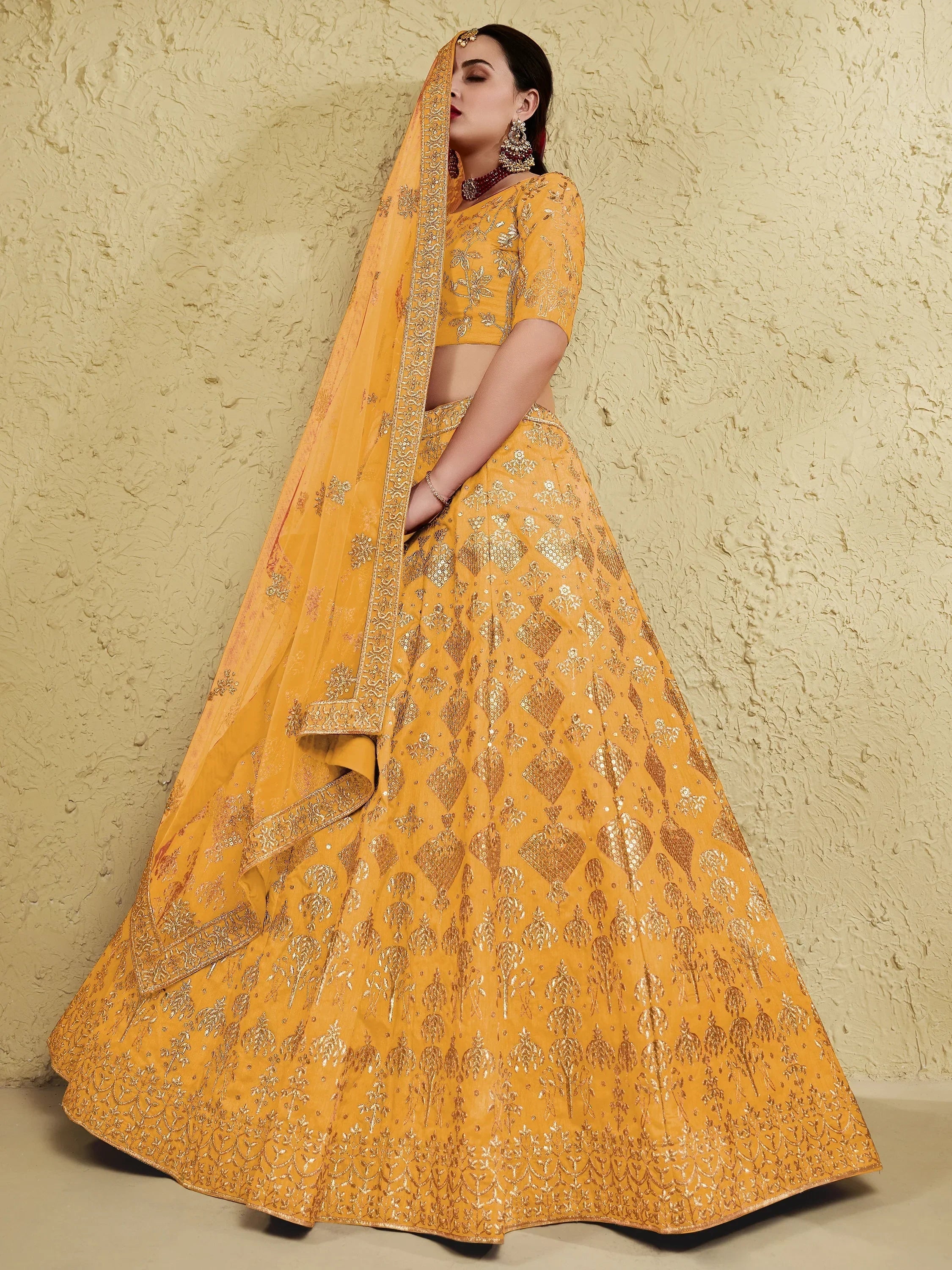 Yellow Fascinating Embroidered Silk Bridal Lehenga Choli With Dupatta