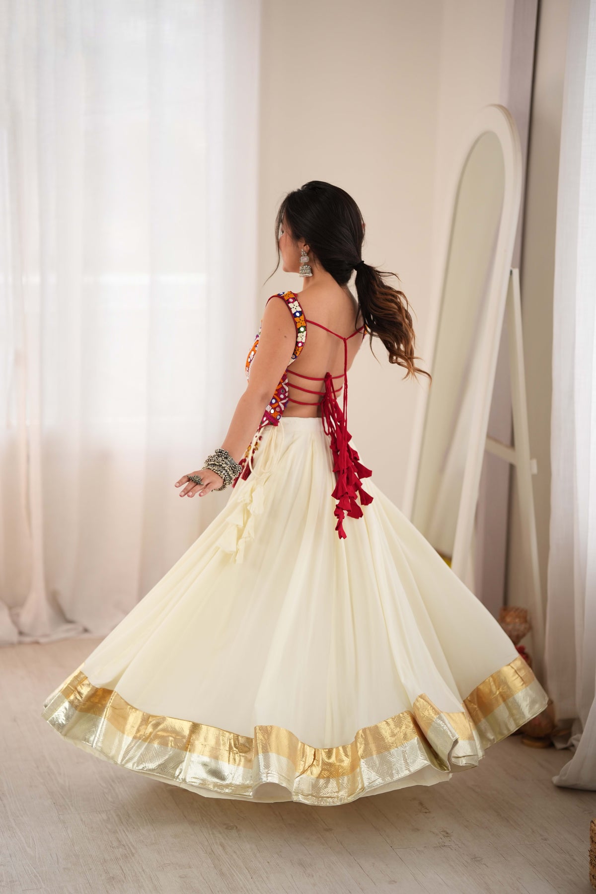 Cream Reyon Lehenga Choli with Heavy Thread Work and Real Mirror Detailing