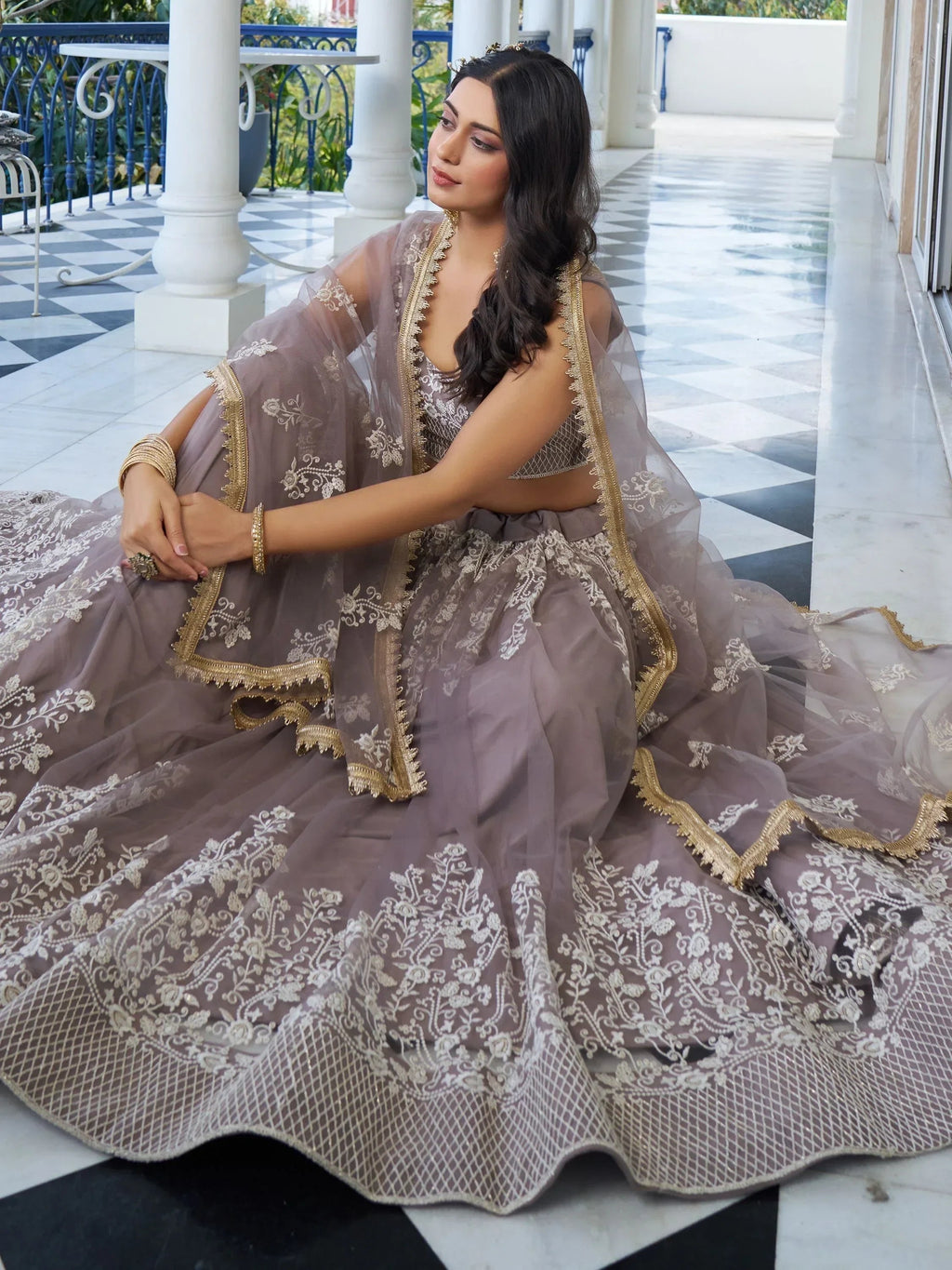 Dazzling Mauve Embroidered Net Engagement Wear Lehenga Choli