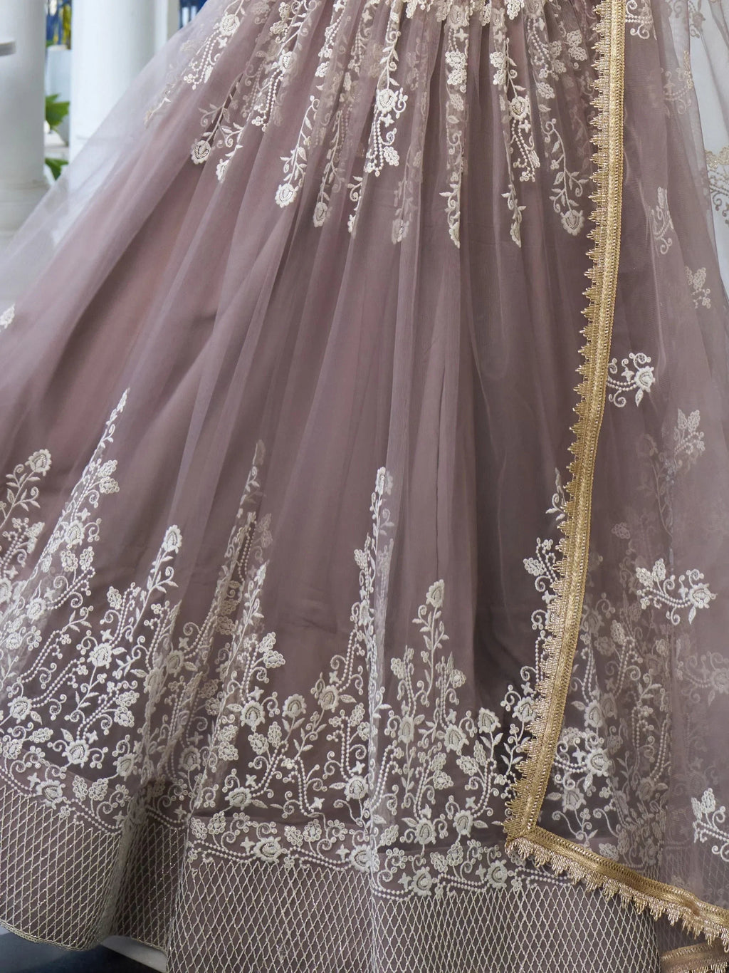 Dazzling Mauve Embroidered Net Engagement Wear Lehenga Choli