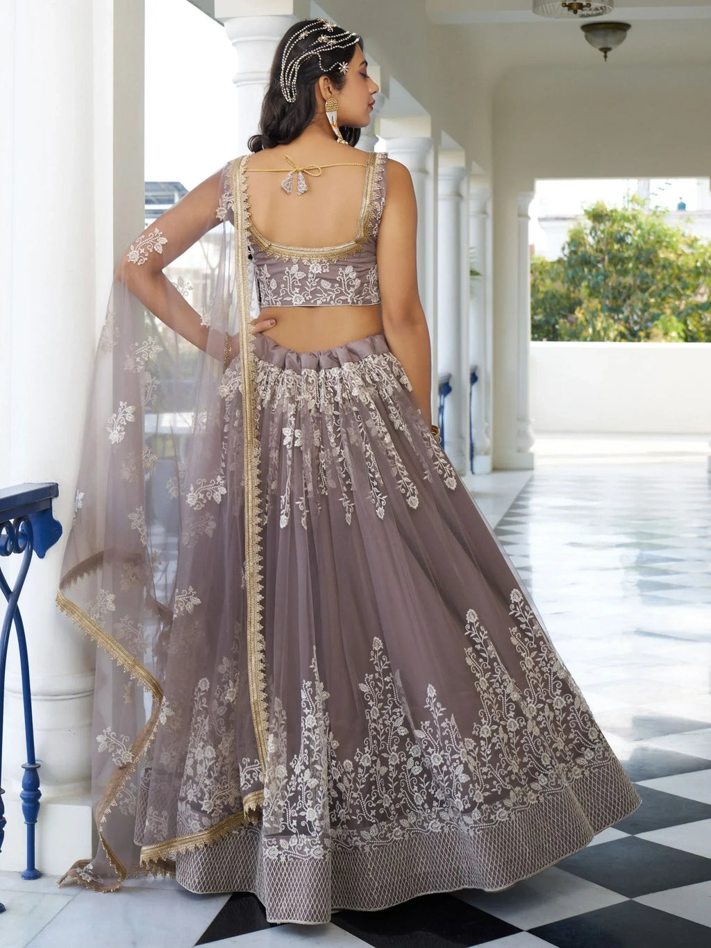 Dazzling Mauve Embroidered Net Engagement Wear Lehenga Choli