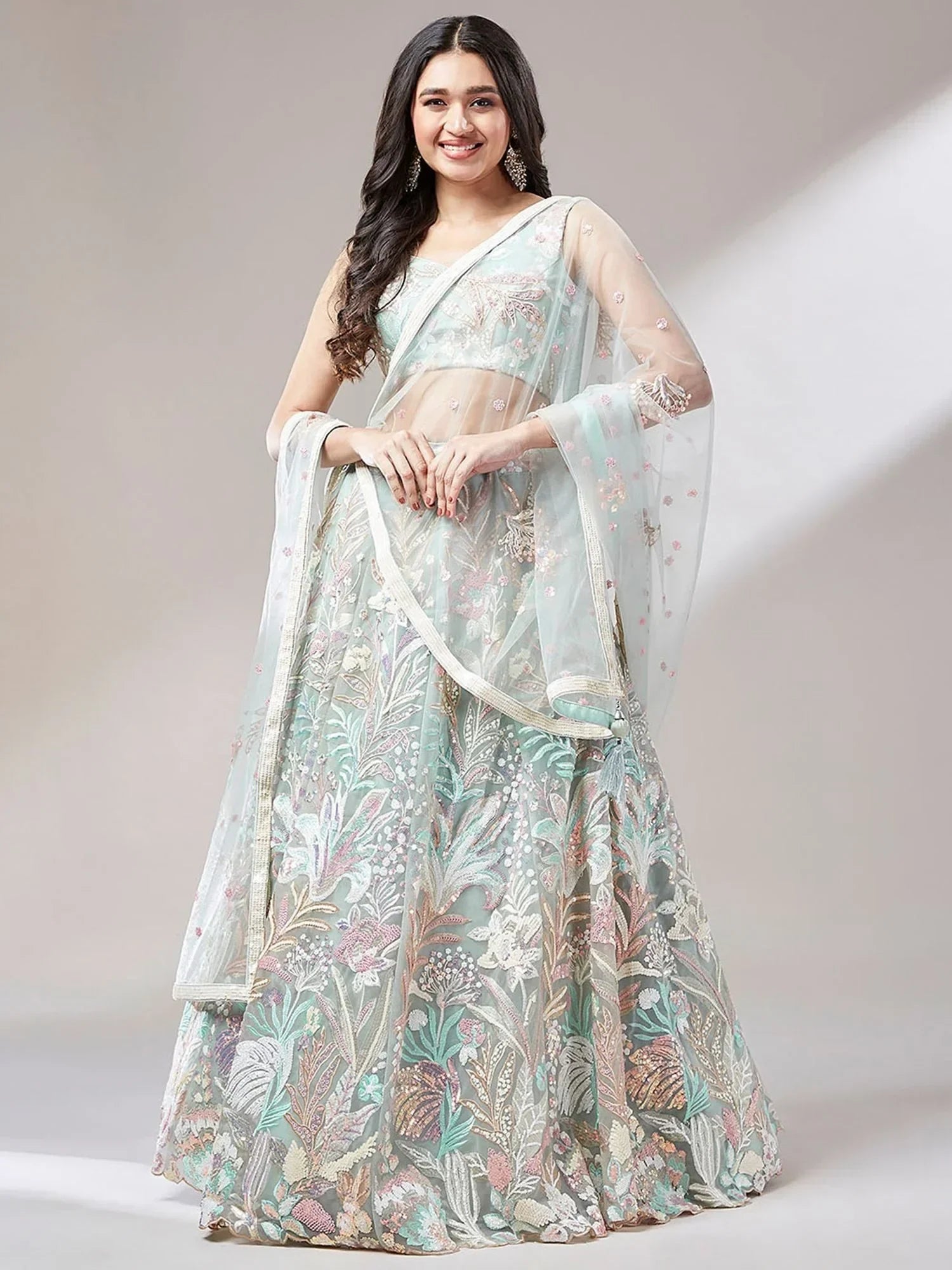 Green Ravishing Color Sequins Soft Net Party Wear Lehenga Choli