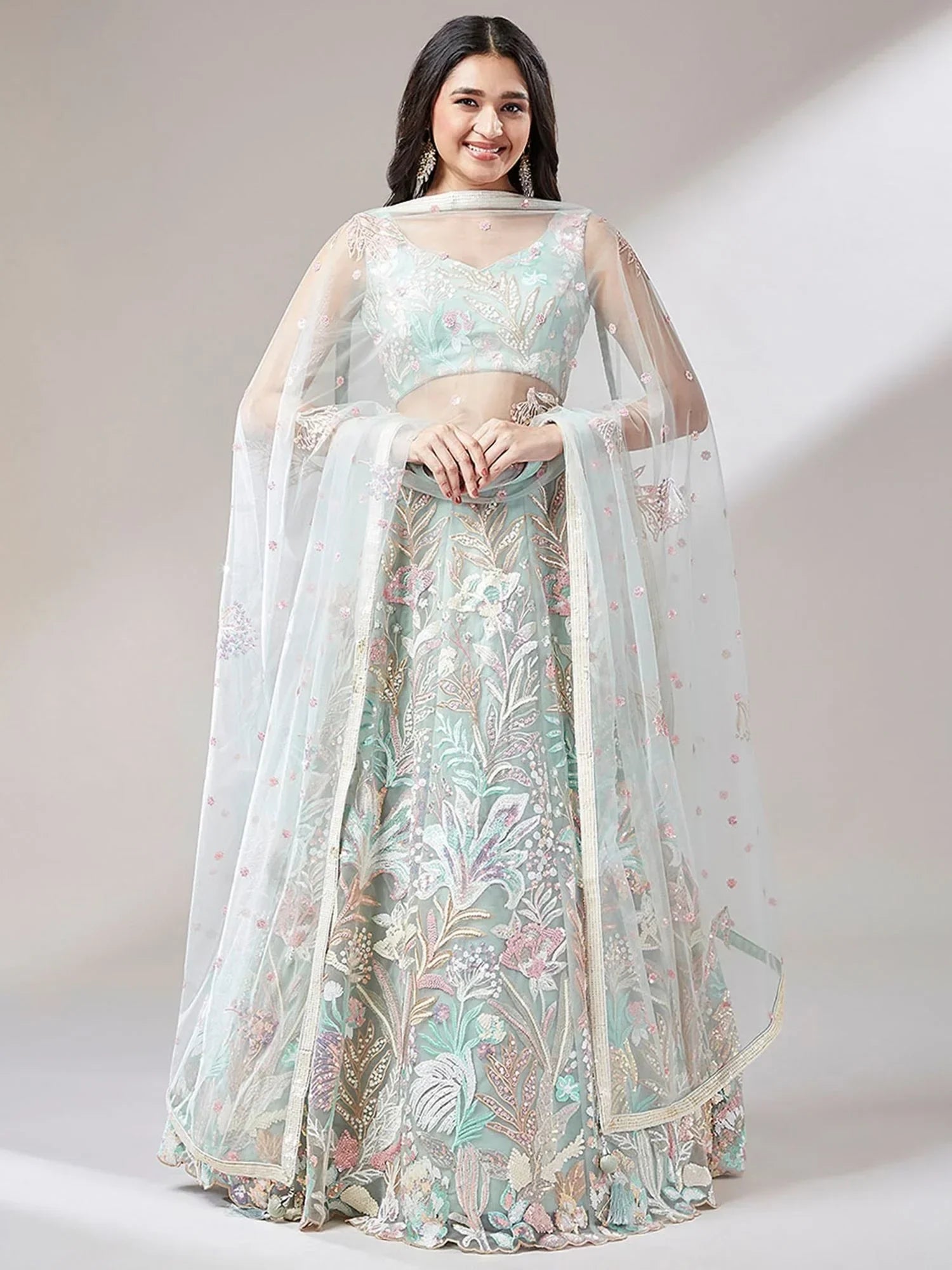 Green Ravishing Color Sequins Soft Net Party Wear Lehenga Choli