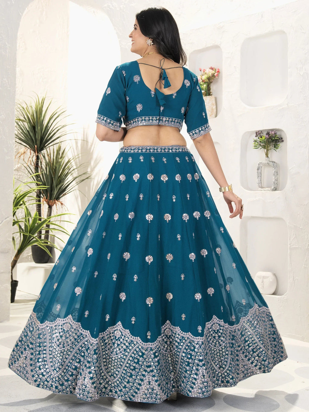 Enchanting Teal Blue Sequins Georgette Bridesmaid Lehenga Choli
