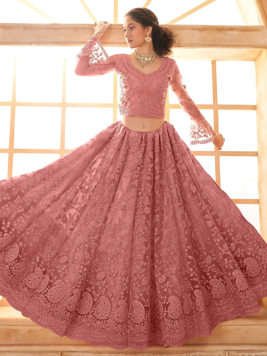 Excellent Dusty Pink Embroidered Net Engagement Wear Lehenga Choli
